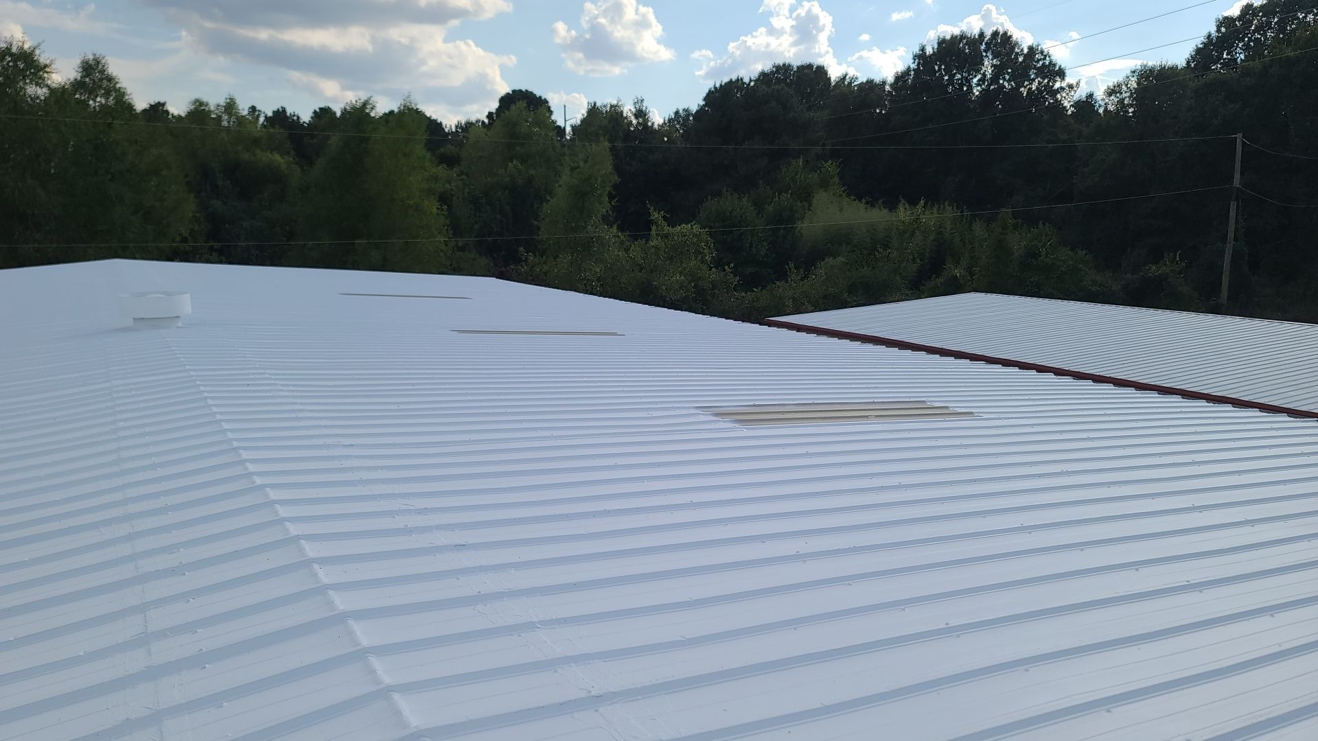 Commercial Metal Restoration System using Aldocoat Coatings by Hostetler Roofing