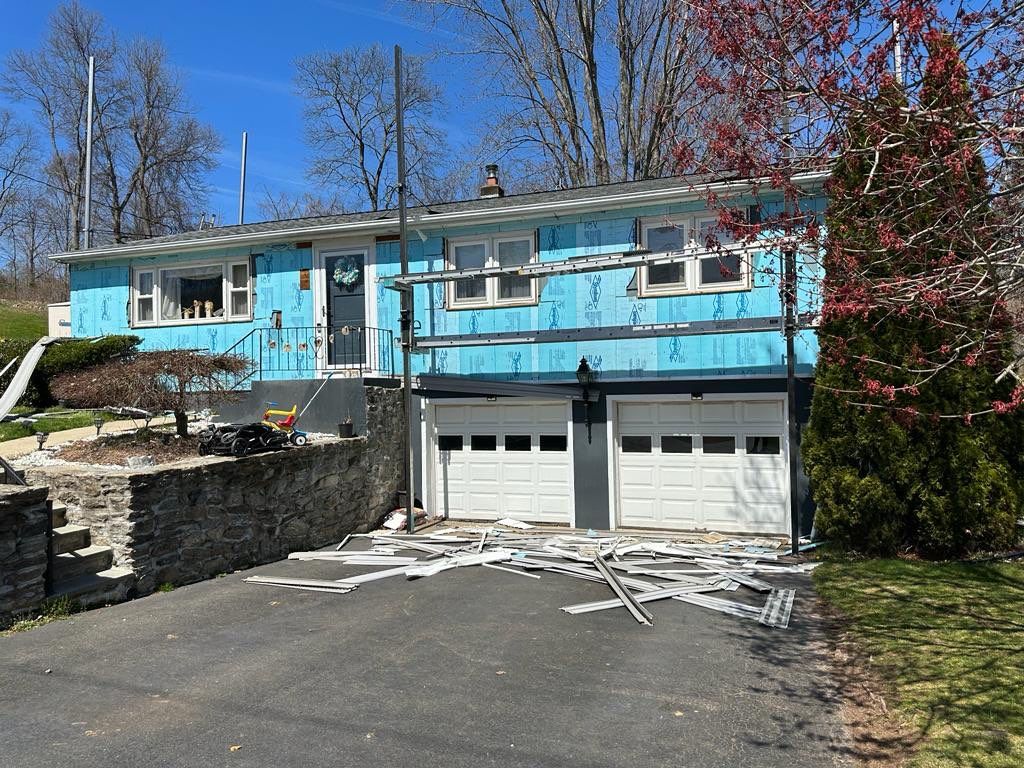 Residential Roofing Installation using Residential Roofing Installation using Owens Corning TruDefinition Duration - Quarry Gray & Sterling Gray Mainstreet siding by A Plus Exterior