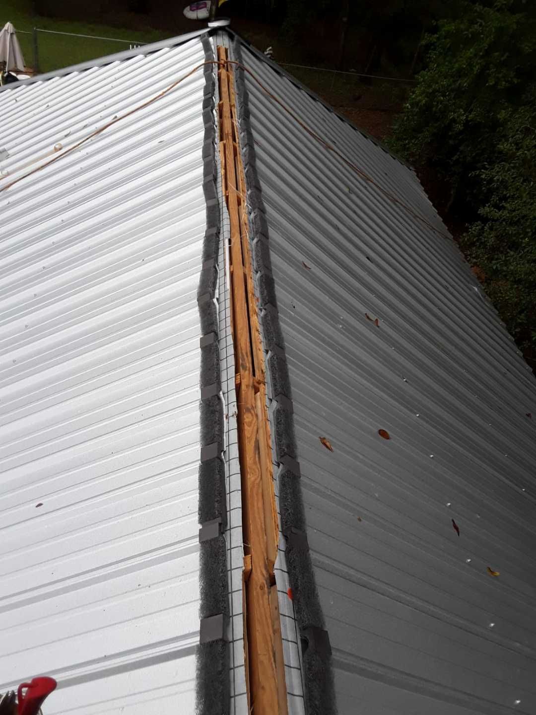 Residential Roofing Installation using Metal roofing by American Roofing & Construction LLC