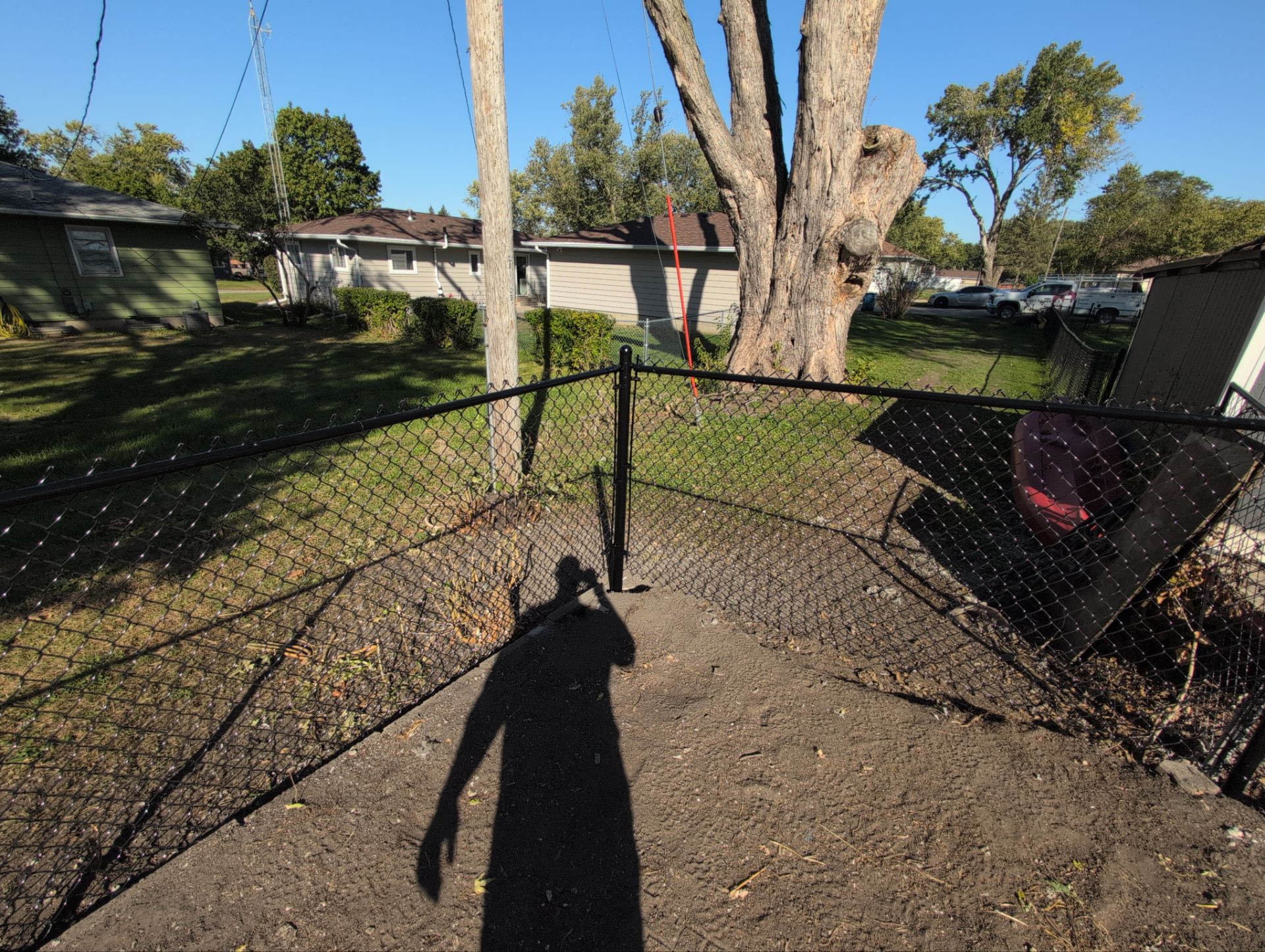 Black Chain Link Fence Installation for Waterloo Residential Property by Perfect Picket Fence and Stain
