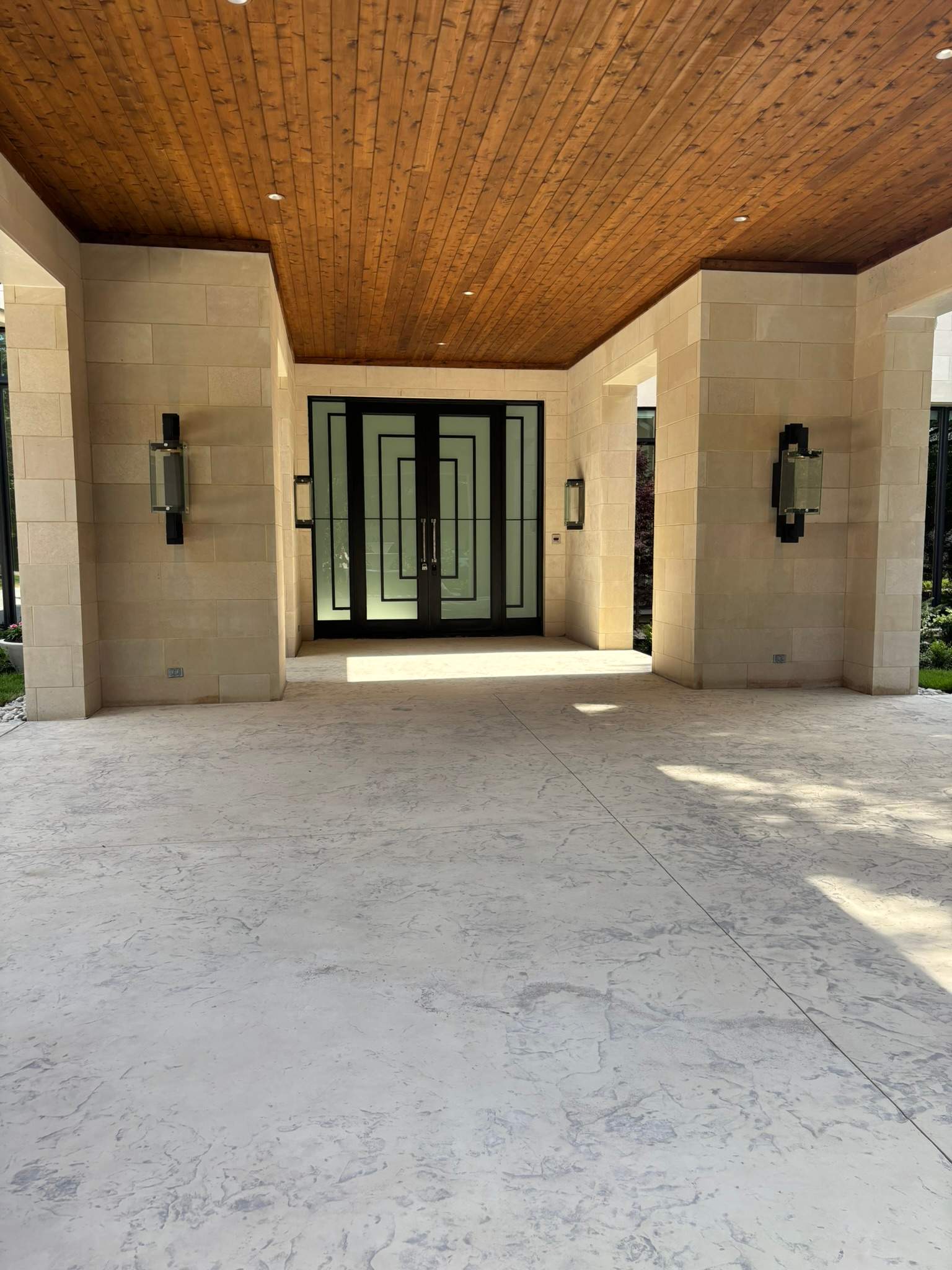 Modern Metal and Glass Entryway Installation with Custom Hardware Finishing in Dallas by Solara Custom Living