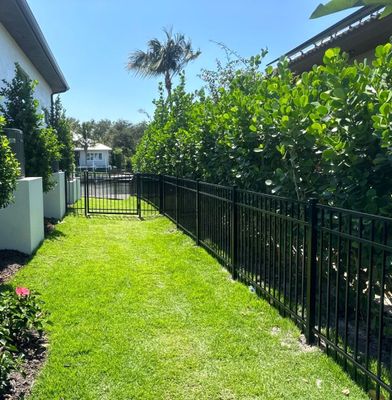 Aluminum Fence Installation using Black 3 Rail Aluminum Fence