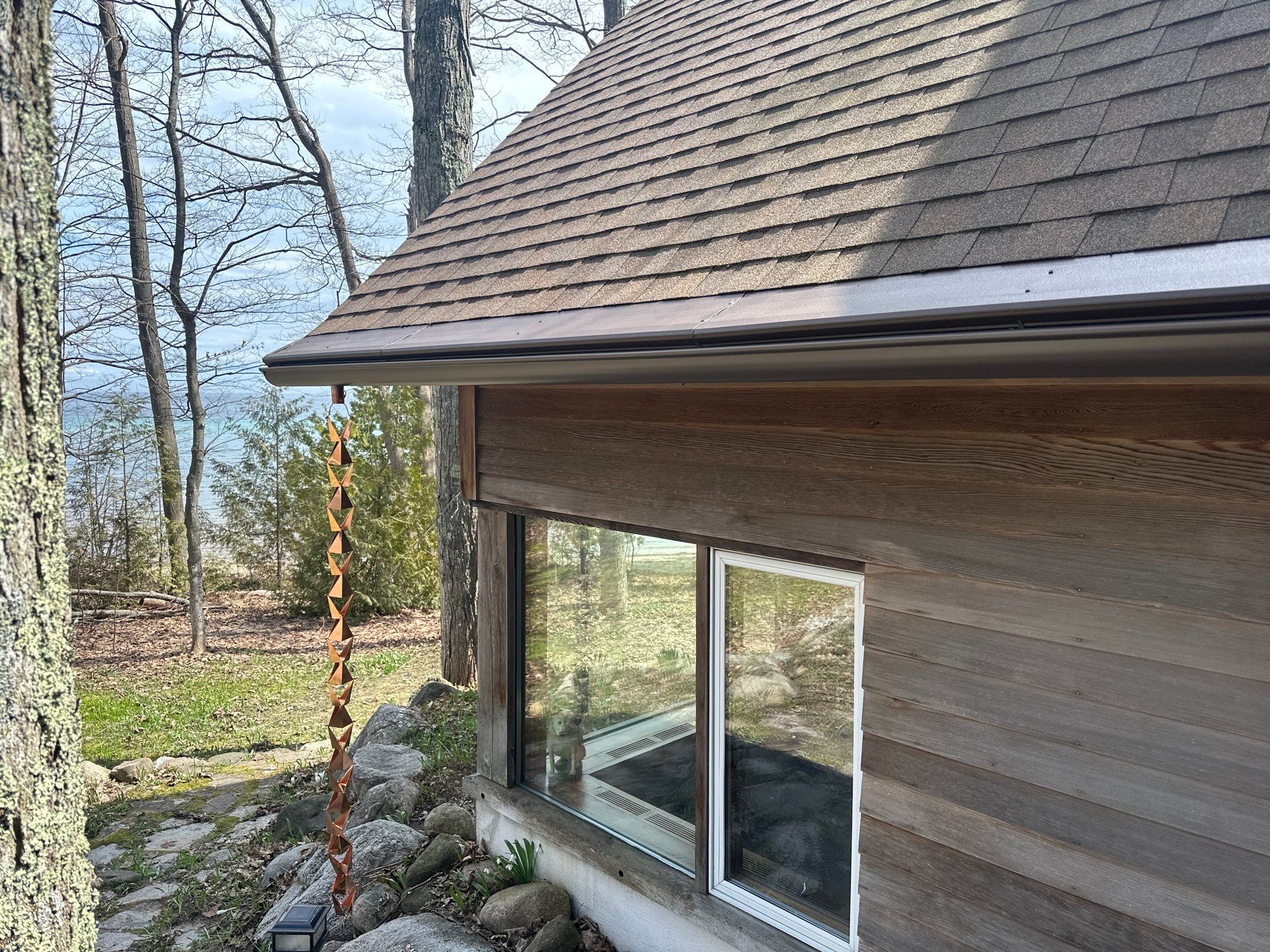 Gutter, Gutter Helmet and Copper Rain Chain Installation in Suttons Bay by Rainbow Seamless Systems