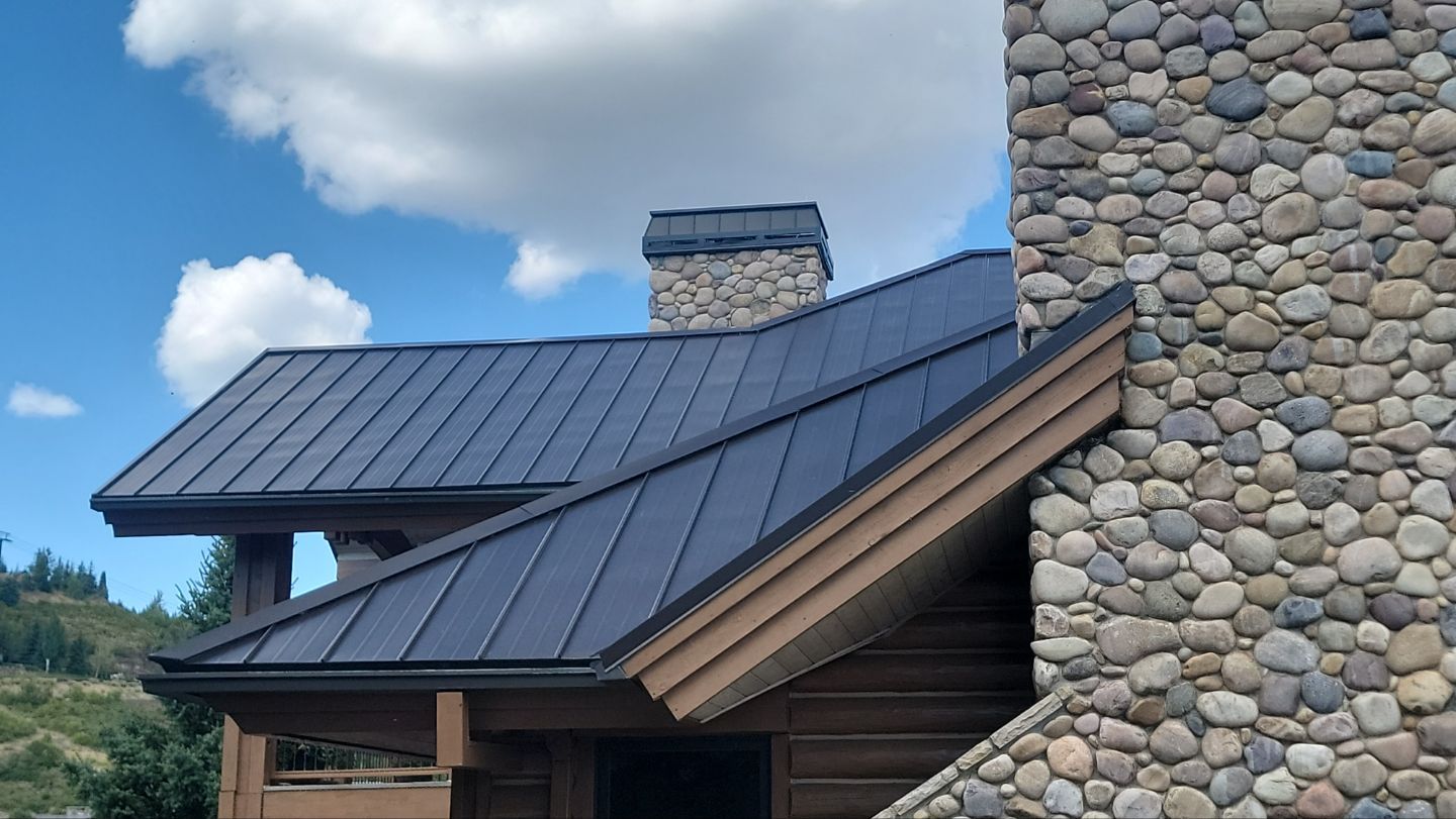 Standing Seam Metal Roof Replacement After Snow Damage by ASAP Roofing & Restoration