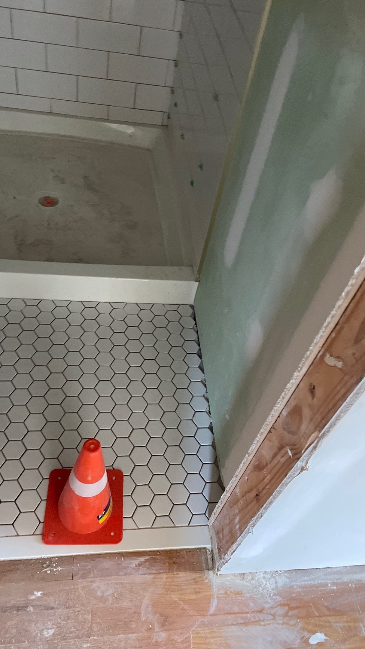 Remodeled Home with new tile floors, Showers and Refinished Oak Floors with stain and Waterbased Finish by Footprints Floors of Coastal Carolina