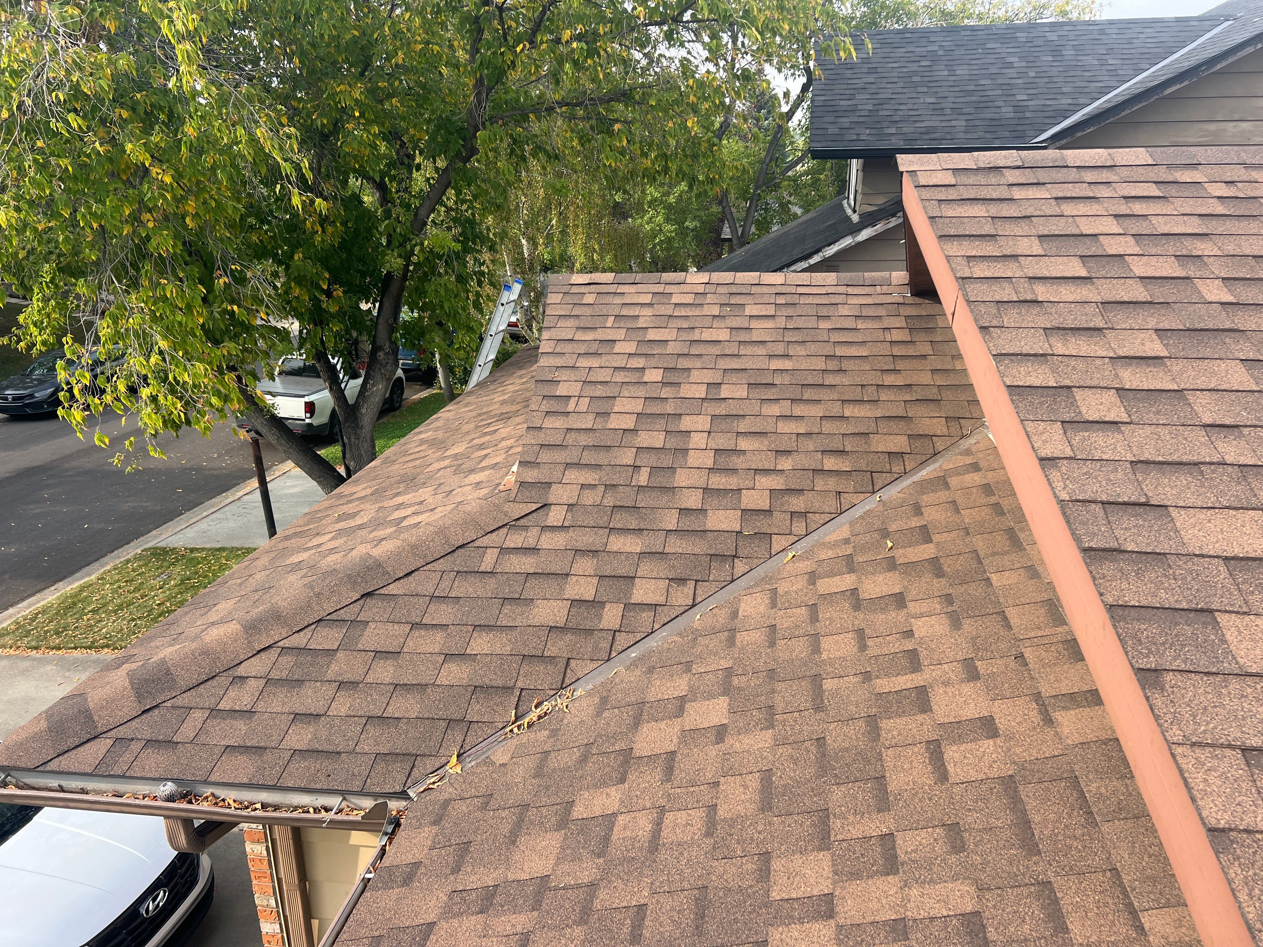 Calgary Chimney Chase Reconstruction and Exterior Siding Replacement by Smart Home Building Systems Ltd.