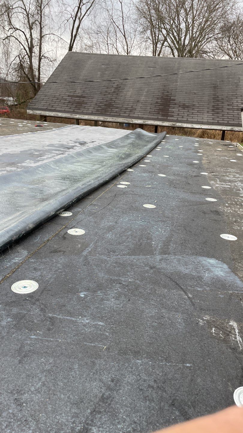 Rubber Roofing  on a residential sunroom by Secure Construction Company Inc