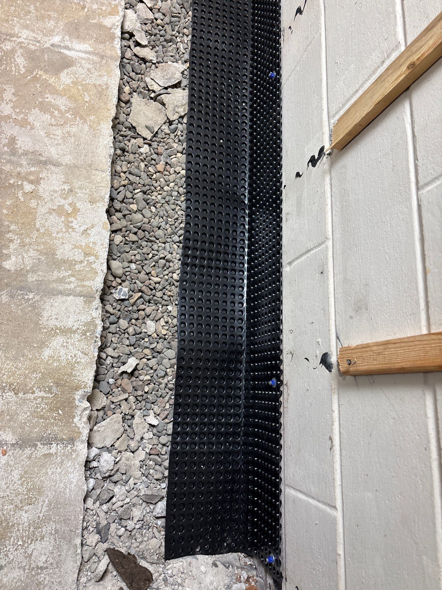 Drain Tile, Sump Pump & Buried Discharge in Columbia Heights by Waterproofing Northeast