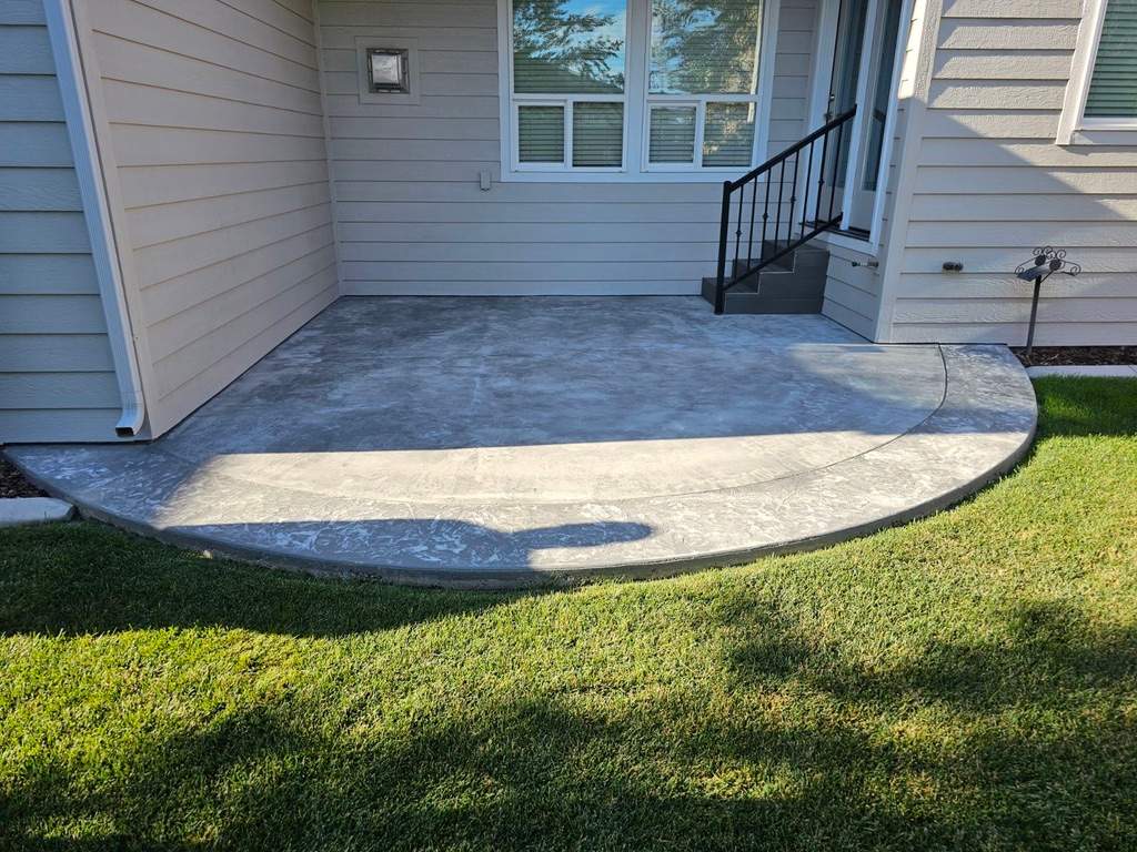 Gorgeous Bordered Patio with Vuba Stone by Mr. Mudd Concrete