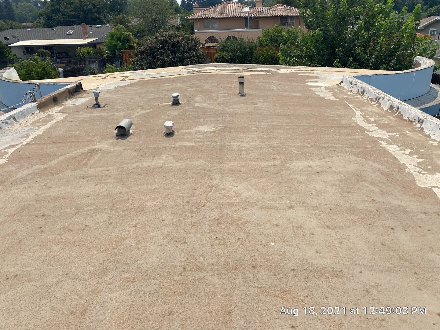Residential Roofing Installation using Spray foam roofing insulation and General Coatings acrylic coatings by Straight Edge Roofing Inc