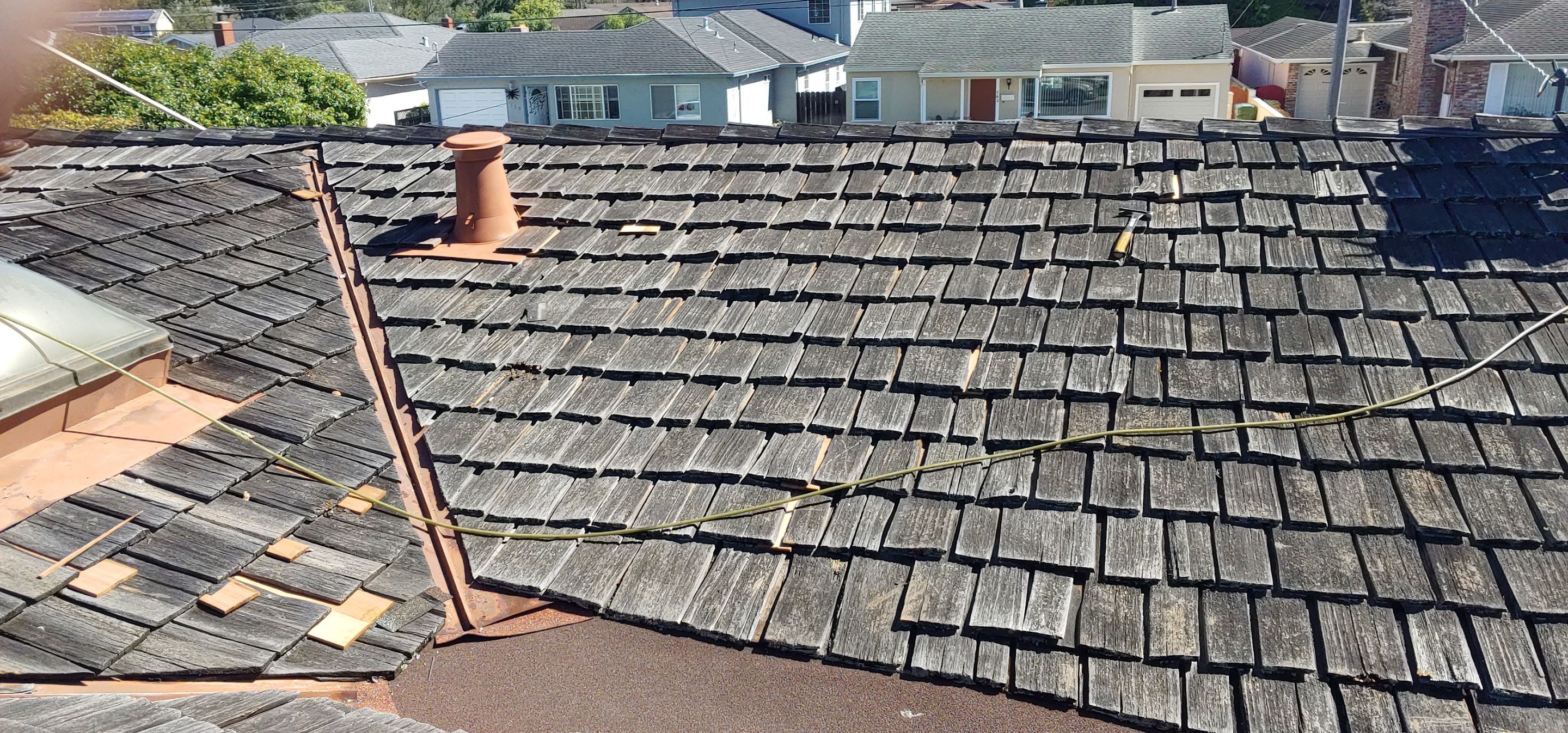 Refurbish and repair shake roof to get ready to sell by Straight Edge Roofing Inc