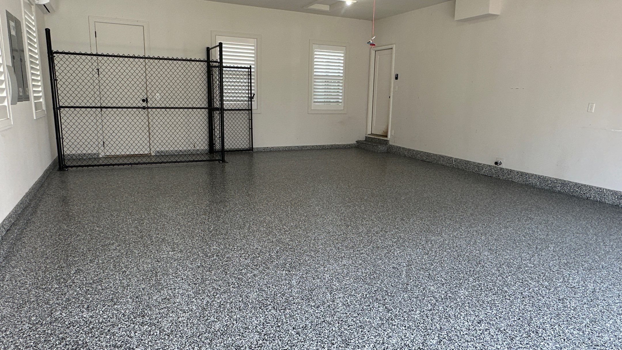 Jim E. went with a beautiful Banner Flake floor  by Banner Garage