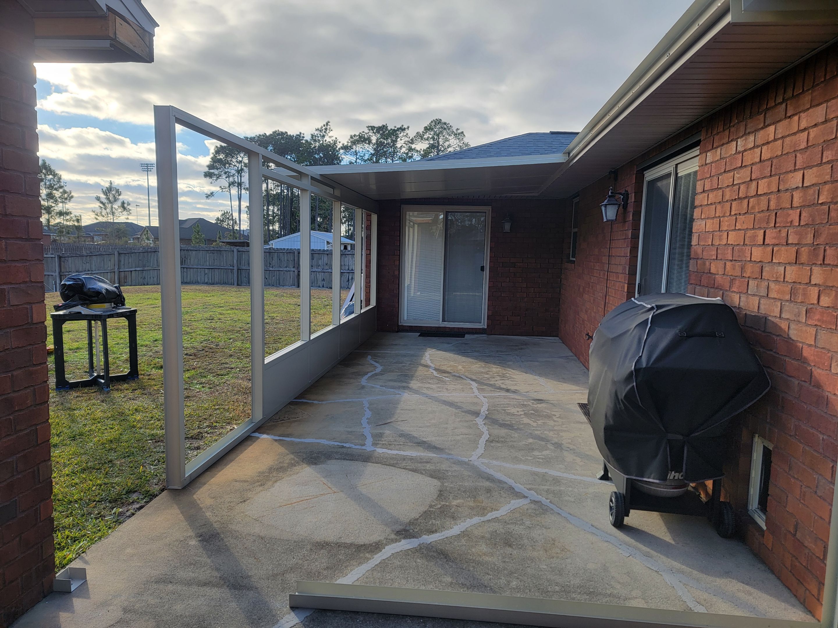 Enclosure w/Vinyl Windows using Colorbeam by Titan Sunrooms