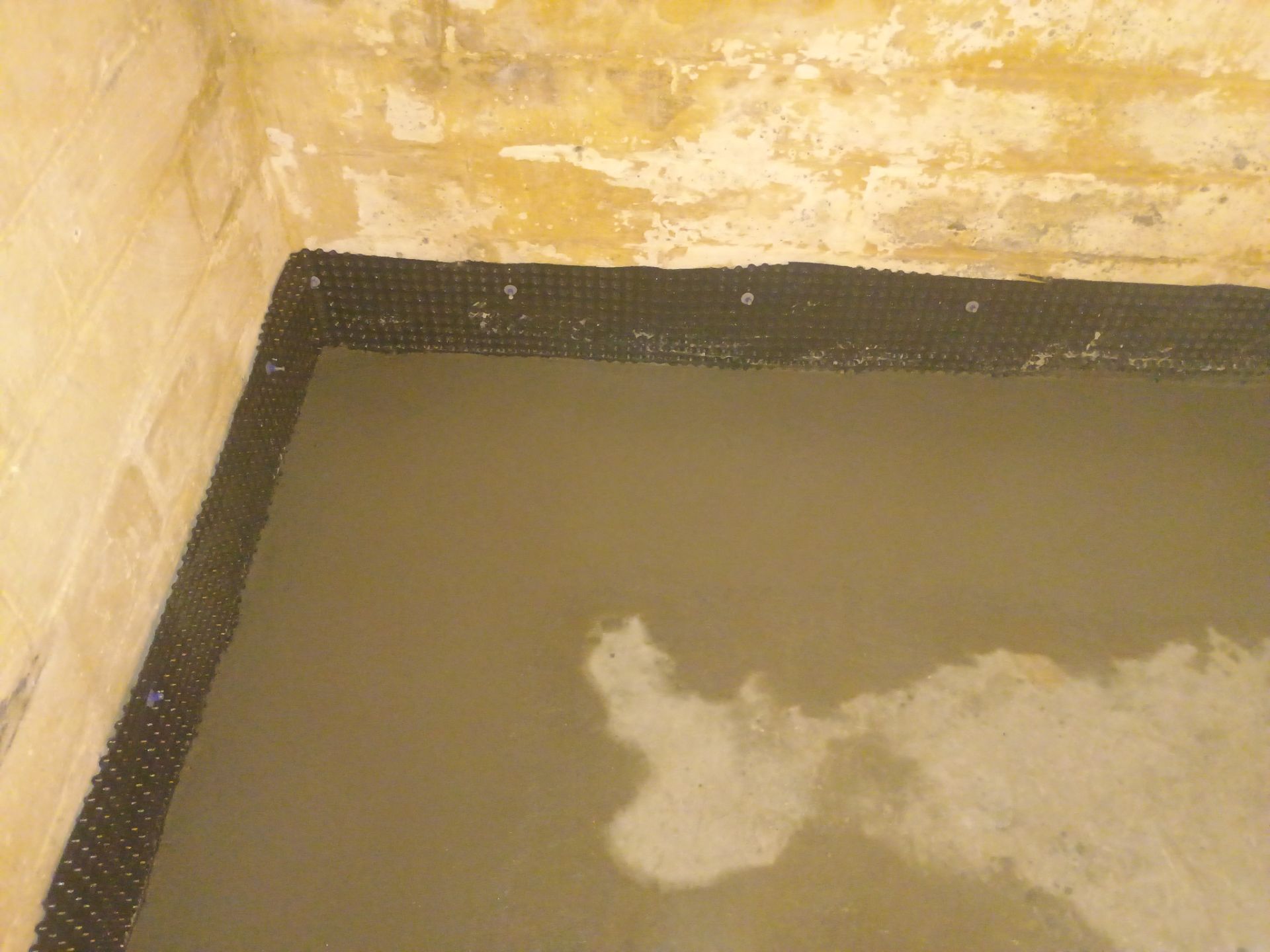 Interior Drain Tile for a South Minneapolis Basement by Waterproofing Northeast