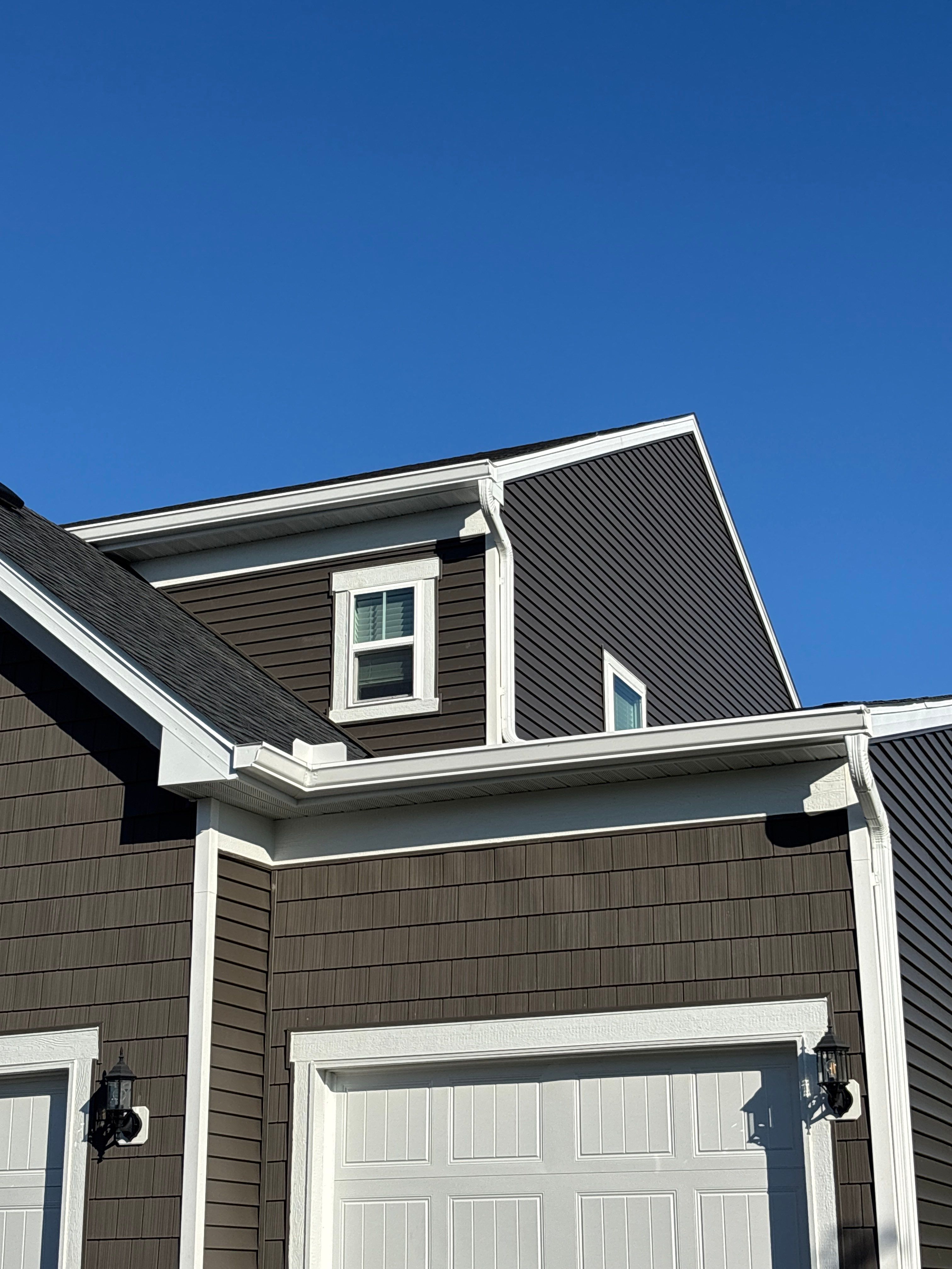 6" Seamless Gutters on 3-Story Home – Rogers, MN by Next Level Seamless Gutters / Exteriors Inc.