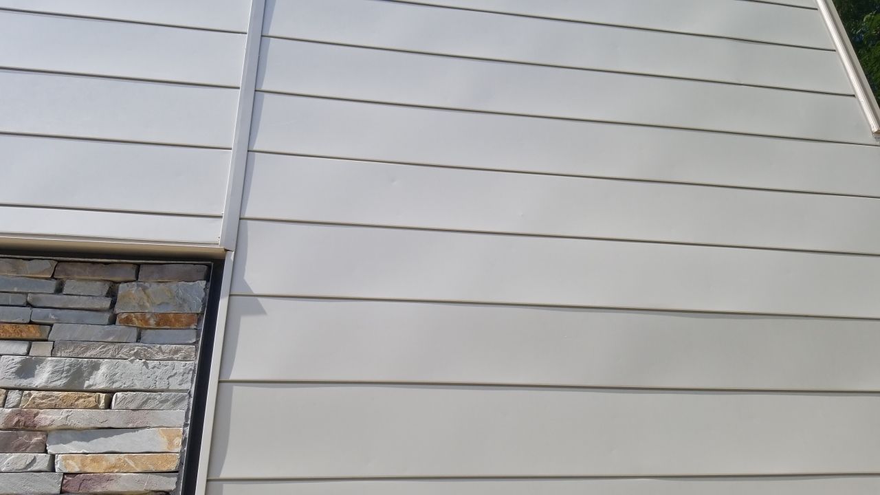 Metal Roofing project using MBCI Flexloc Panels - 22 gauge - silver metallic-in-color by Becker Roofing and Exteriors