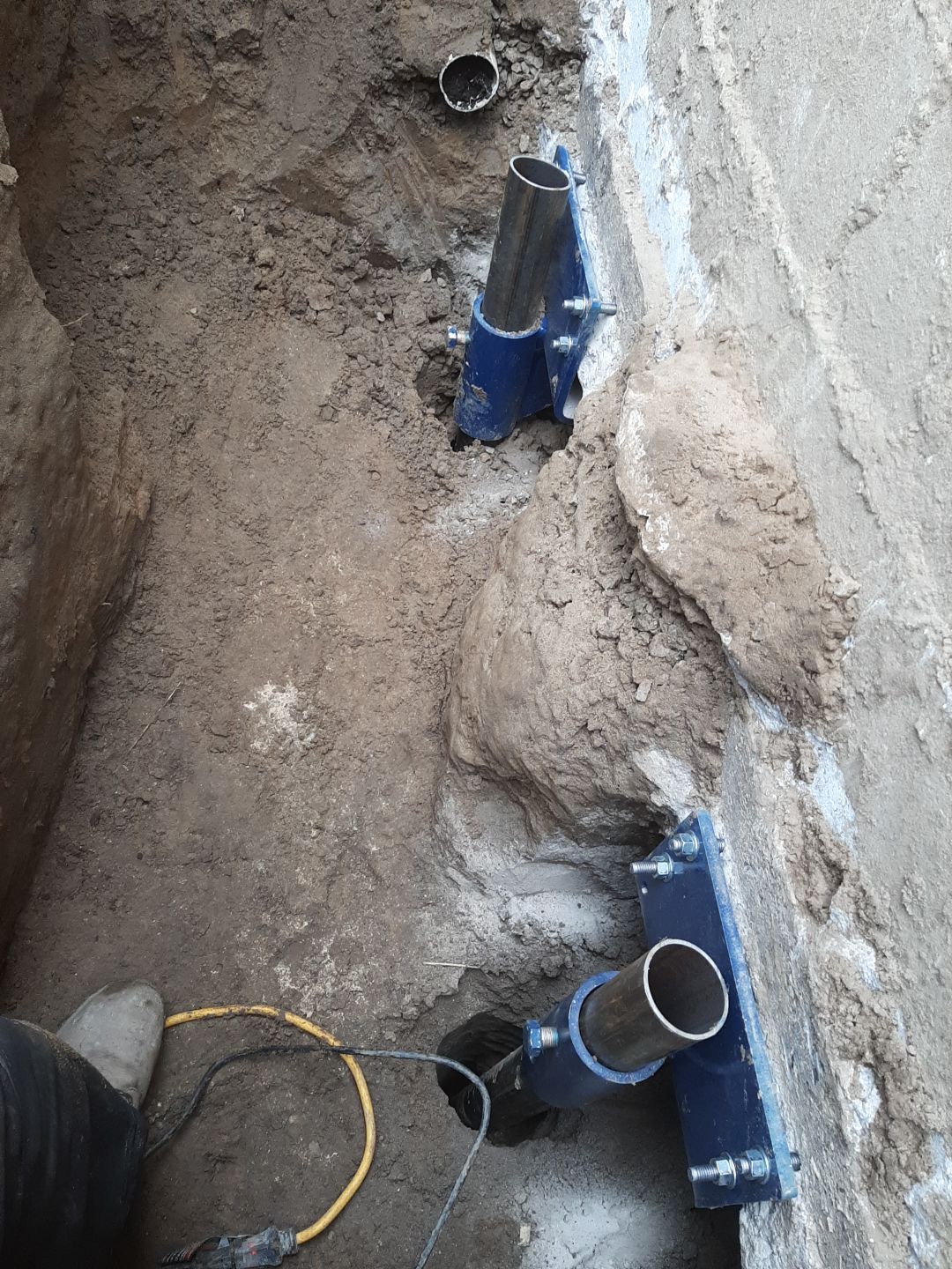 Helical Piers and Wall Crack Injections by Toledo Basement Repair