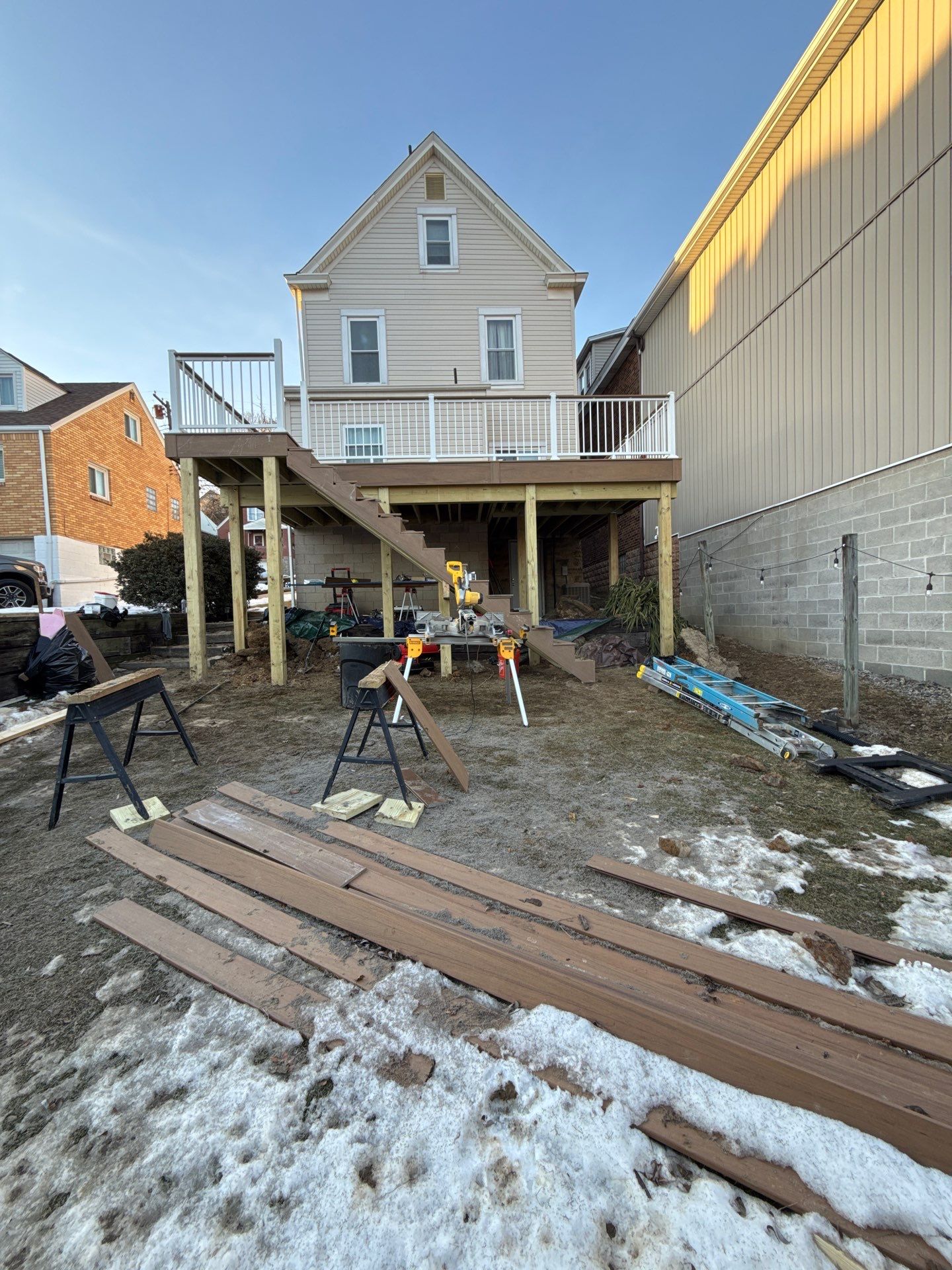 Deck and door by Cousins Roofing Siding & Decks
