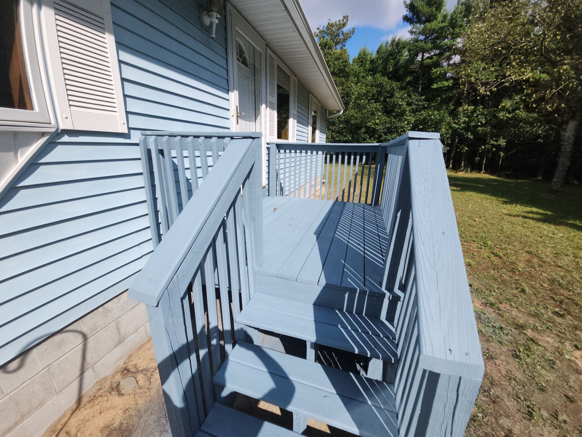 Deck staining and exterior foundation painting! by Gordon Painting