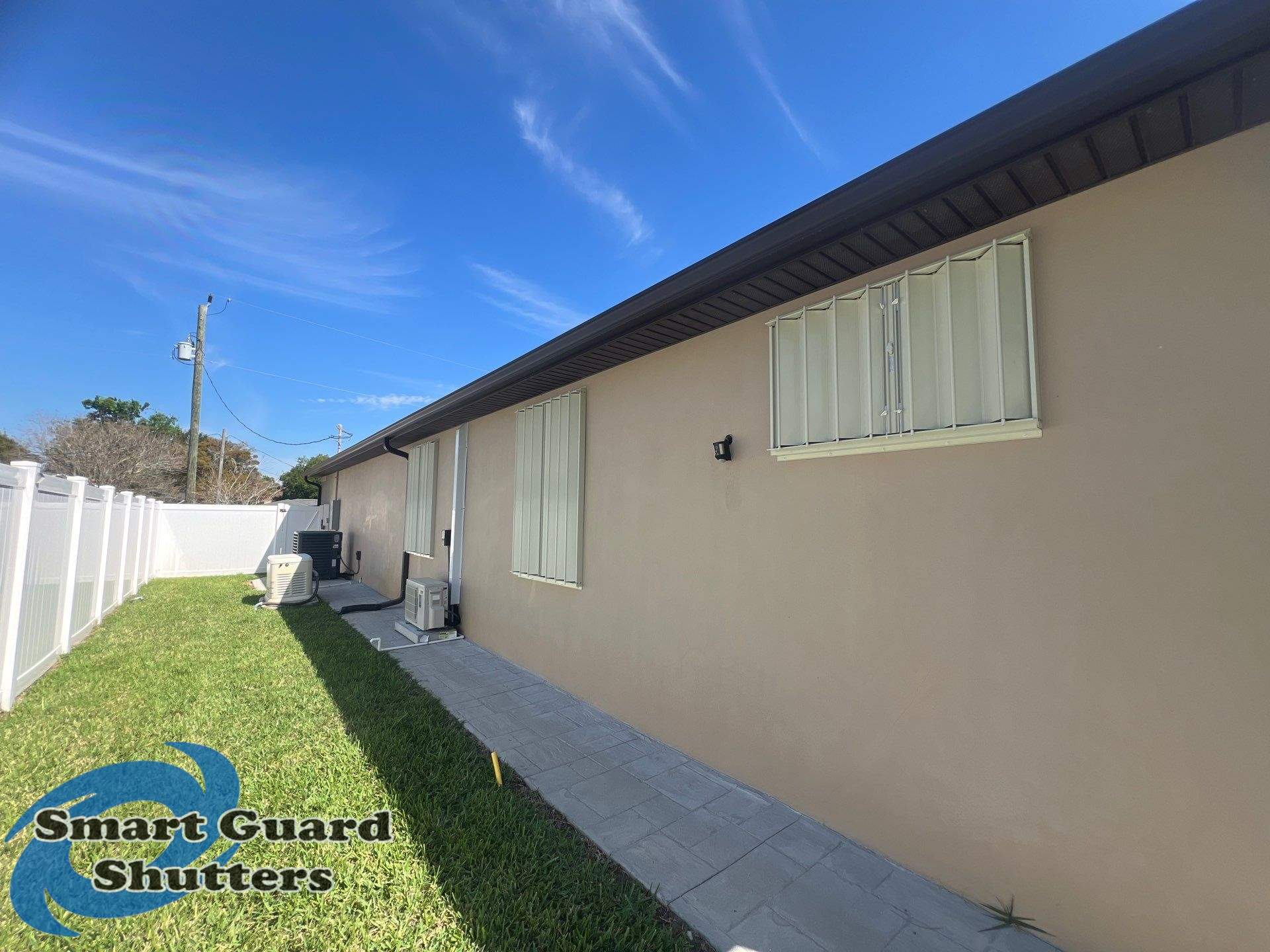 Hurricane Protection in Tan / Ivory by Smart Guard Shutters
