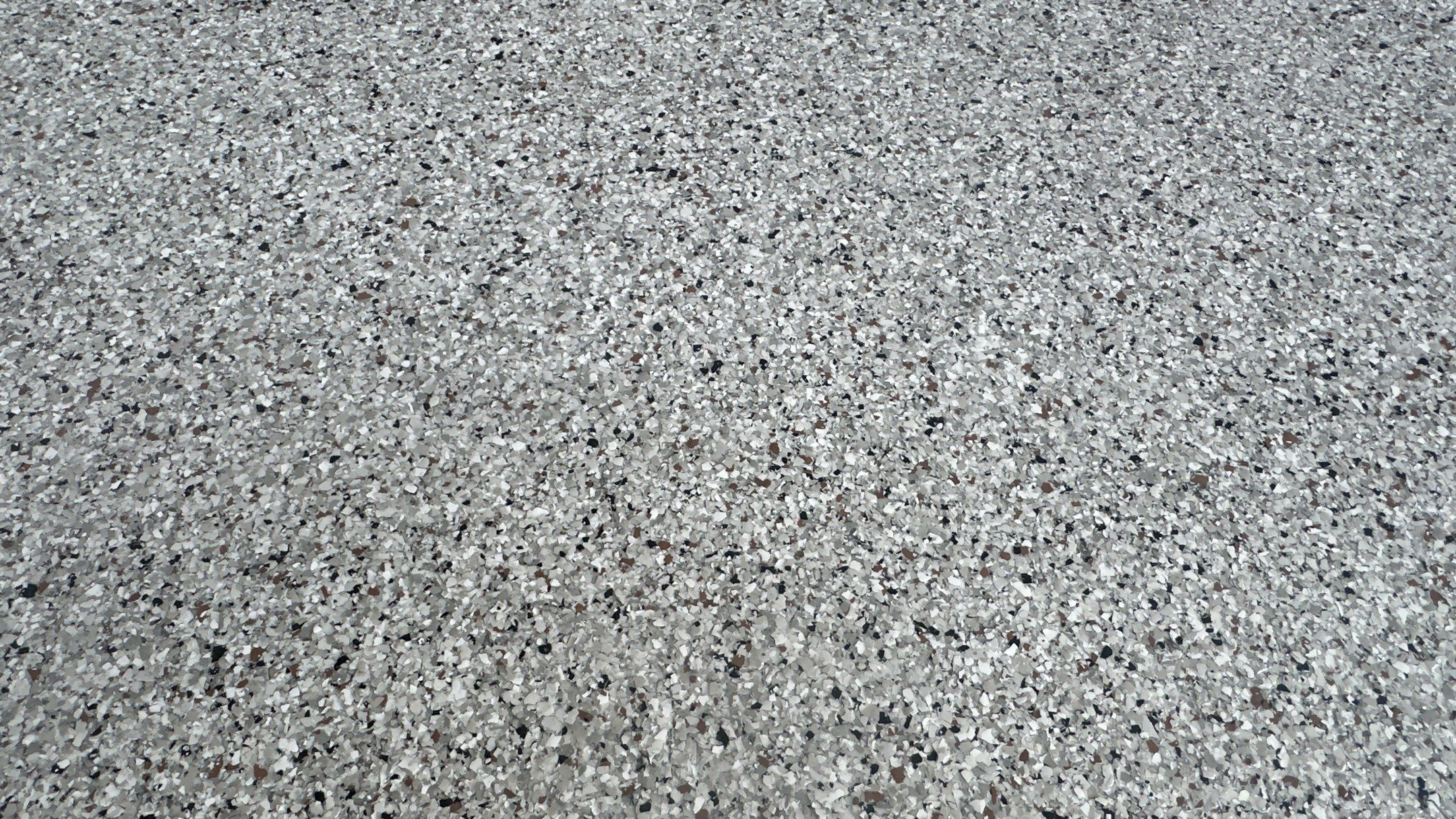 Megan J. added cabinets and slotwall to her garage. Plus a New Floor by Banner Garage