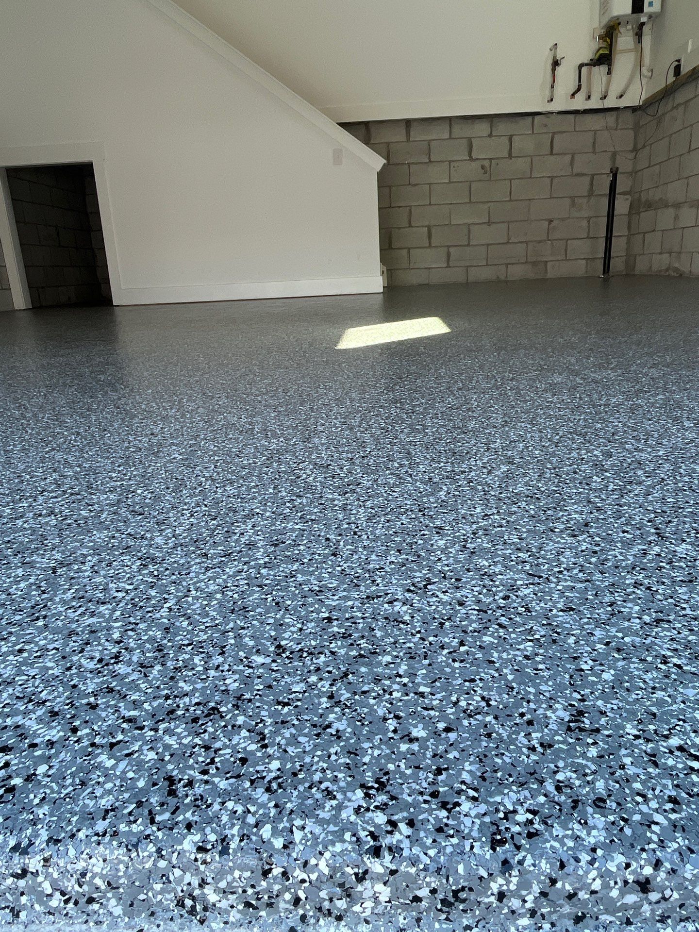 Garage Floor Coating using Wombat by My Garage Floor Guys