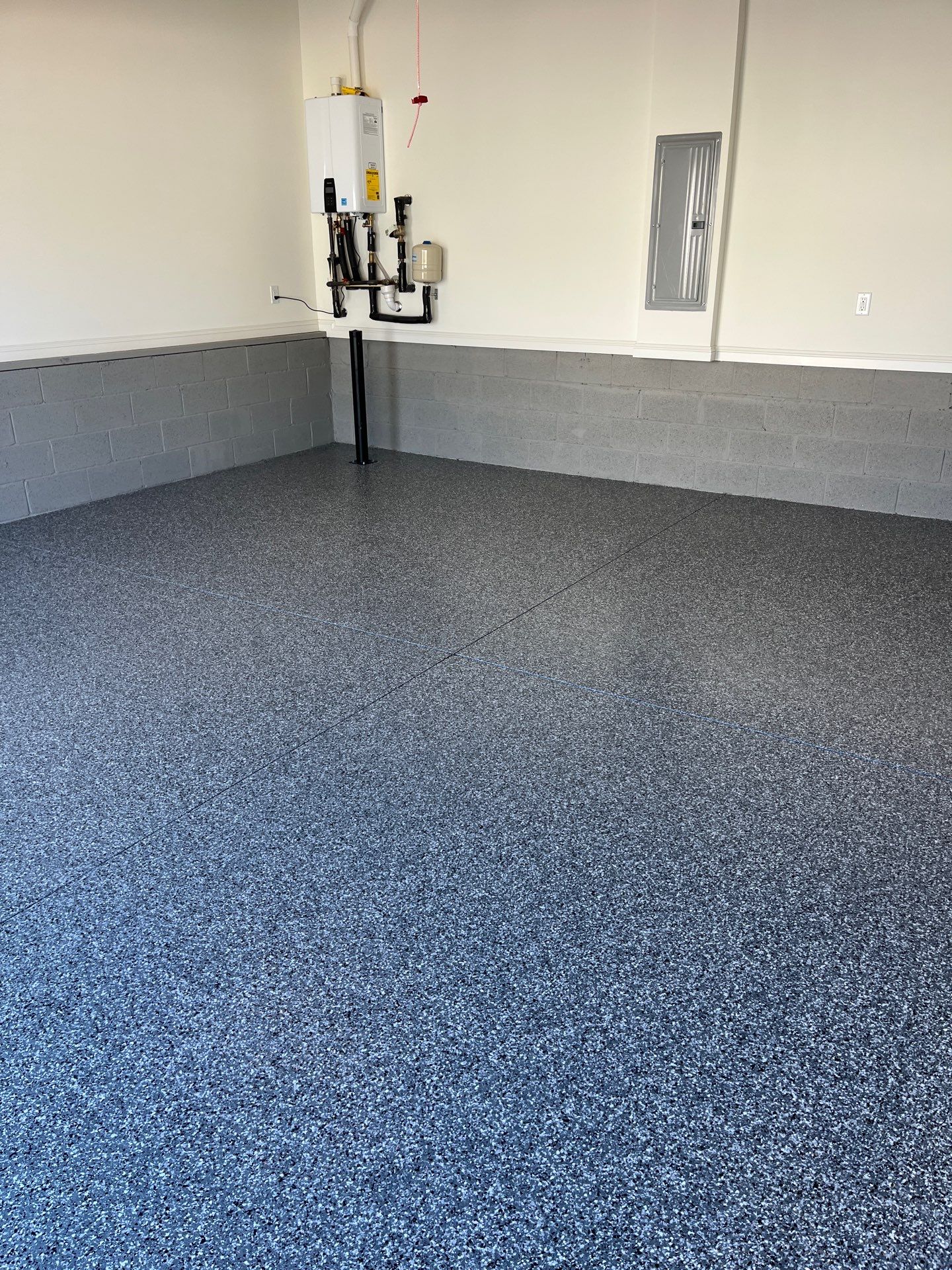 Garage Floor Coating using Wombat by My Garage Floor Guys