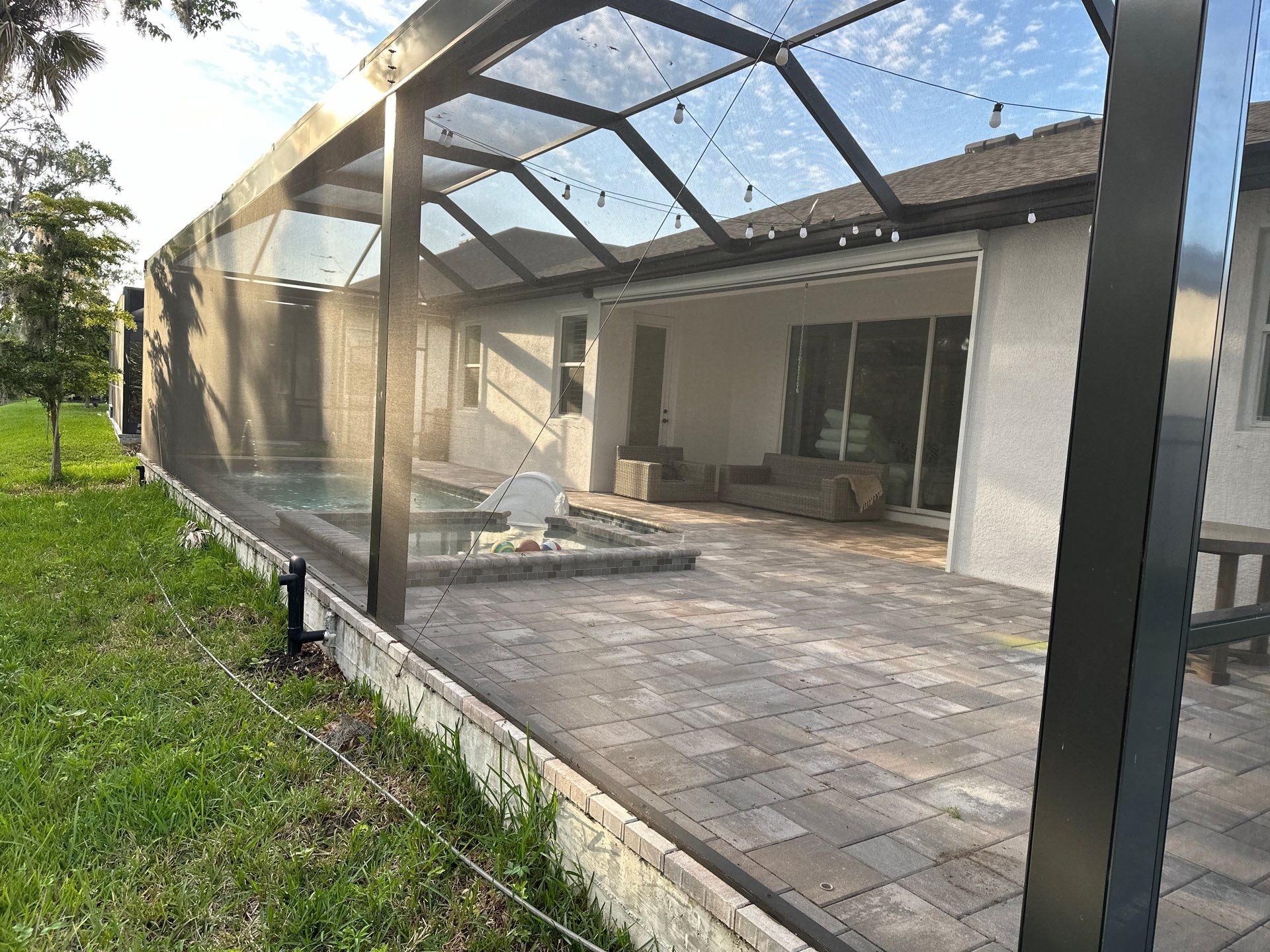 Screen Enclosure & Paver Pool Deck Cleaning in Trevesta Community, Palmetto, FL | Sunshine AquaWash by Sunshine AquaWash