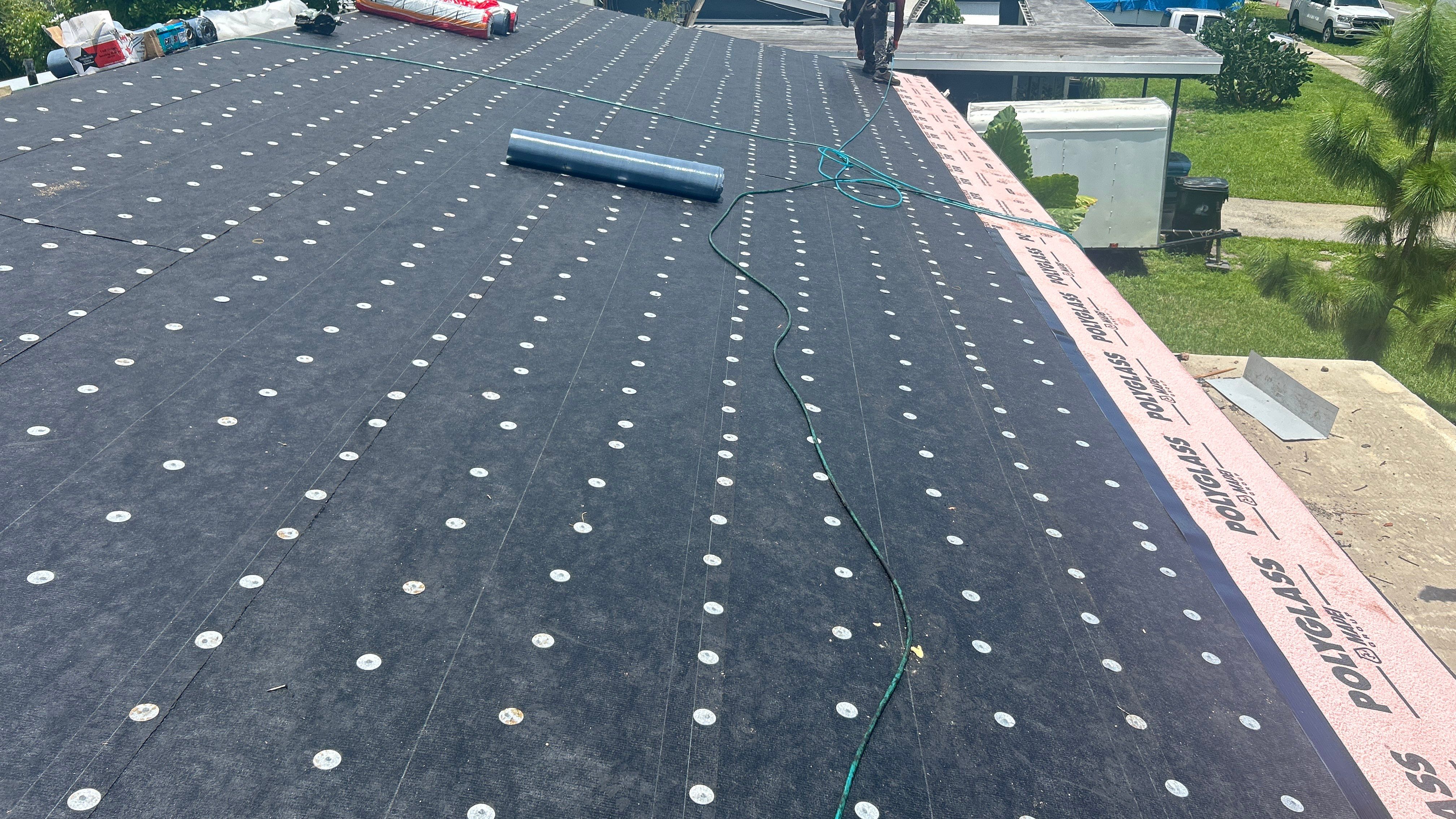 Residential Roofing Installation using Polyglass XFR and Polyanchor by Nast Roofing