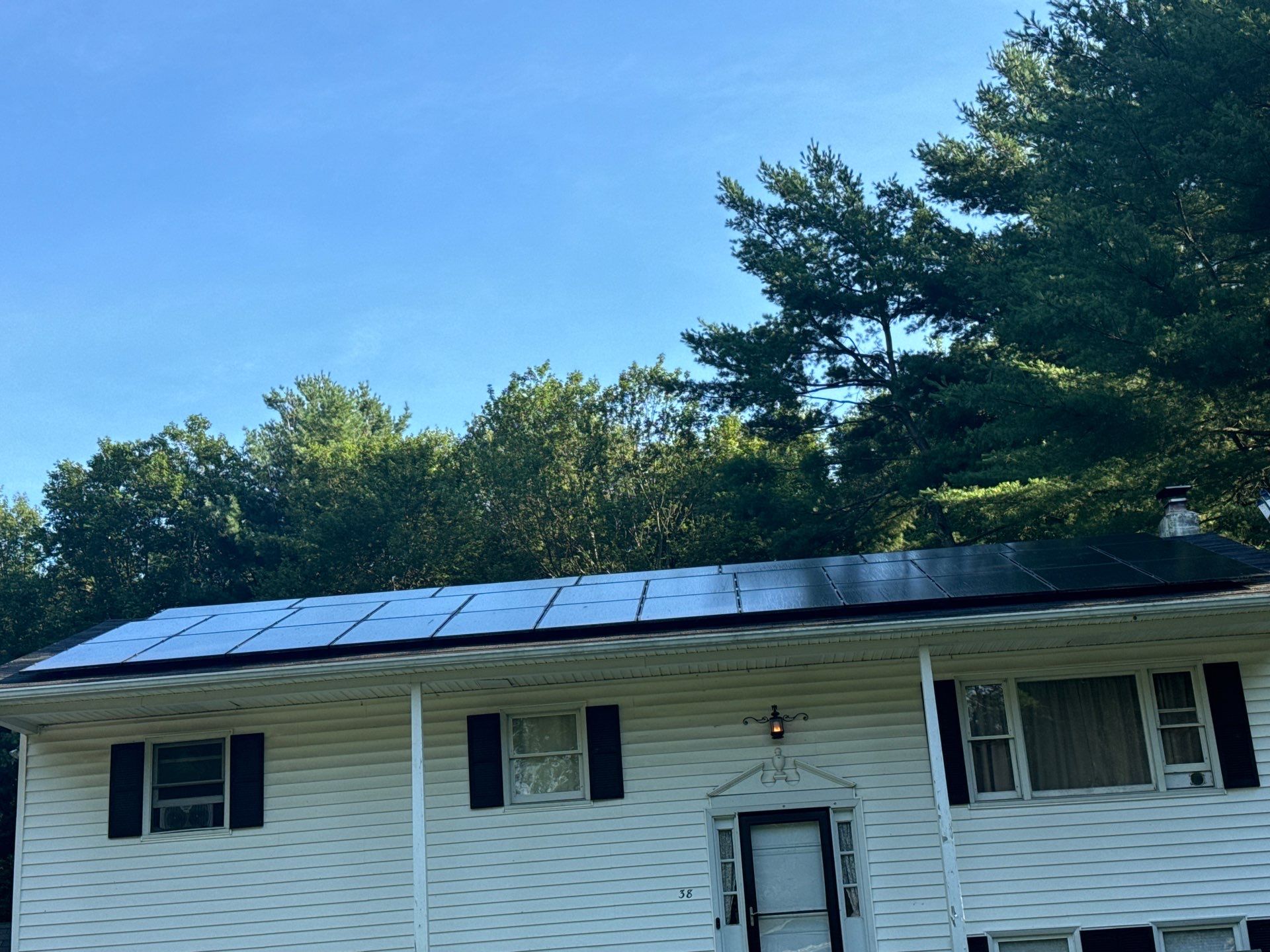 Onyx Black Shingles by Reimagine Roofing