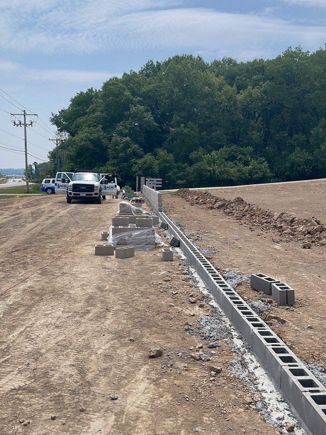 Fence / Retaining Wall using Block then parge by ACE Waterproofing & Basement Solutions