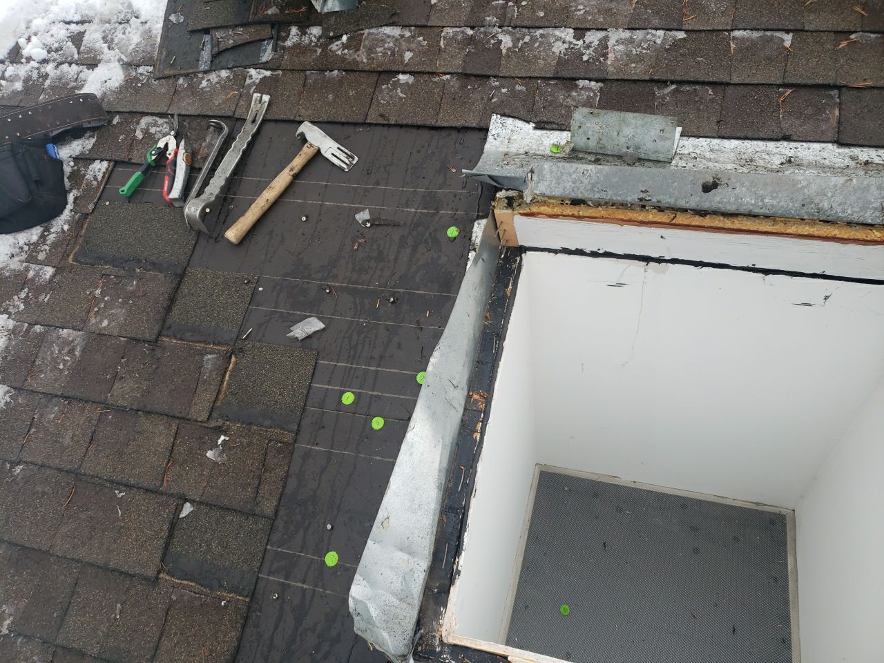 Skylight Removal using Shingle Repair by The Roof Doctor