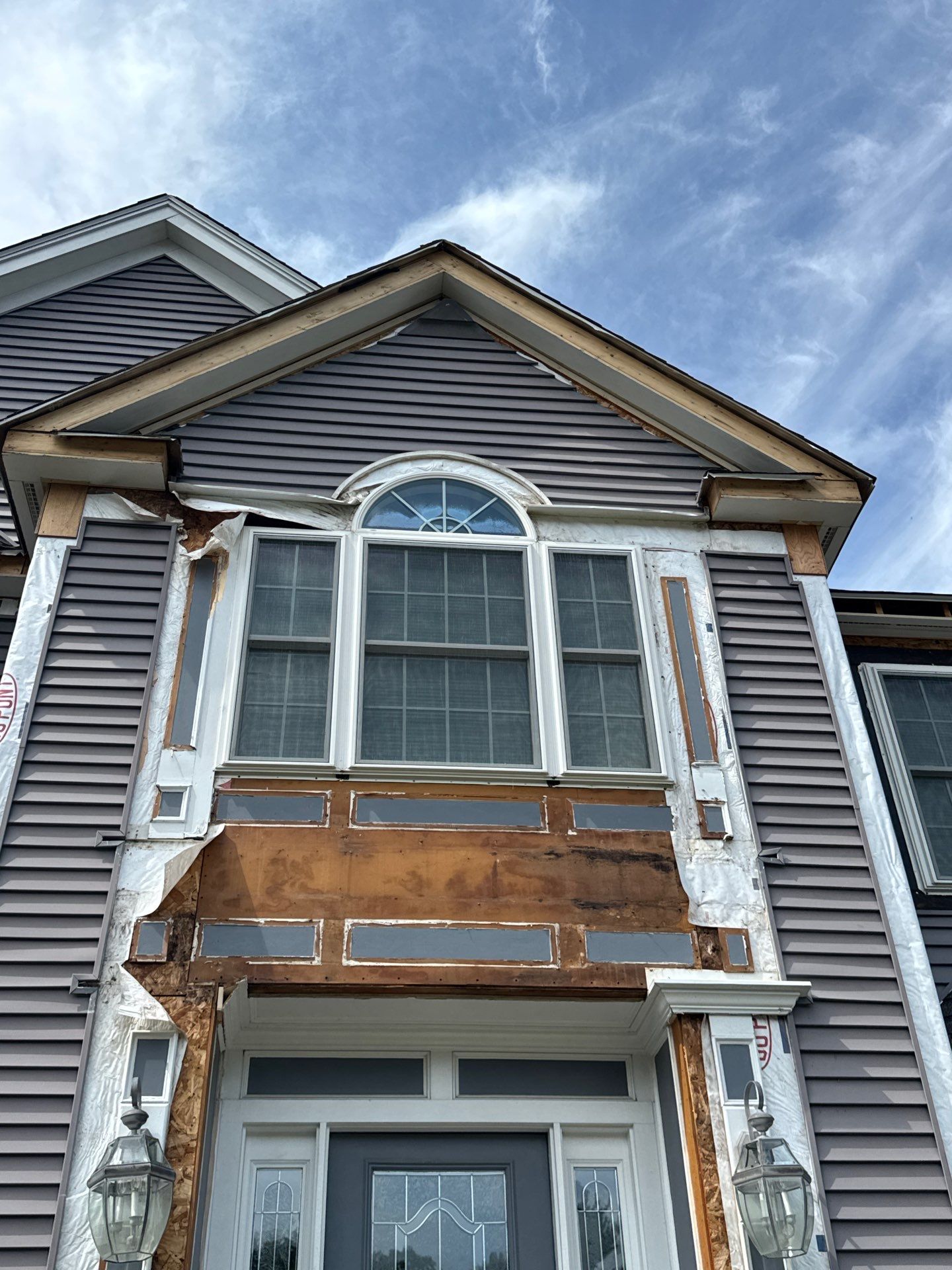 Roof, Trim, Deck, and Gutter Restoration by Mighty Dog Roofing of Greater Middlesex County