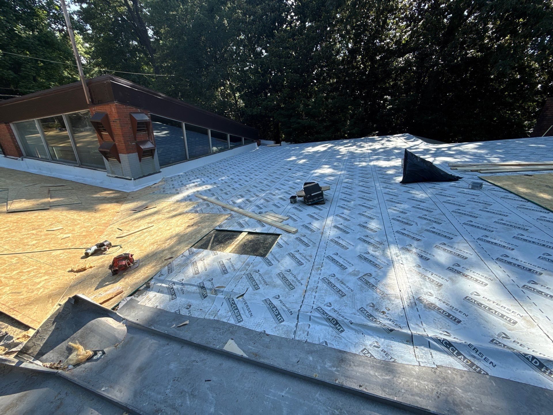 Residential Standing Seam Metal Roof and Membrane Replacement in Memphis by Revival Roofing Services