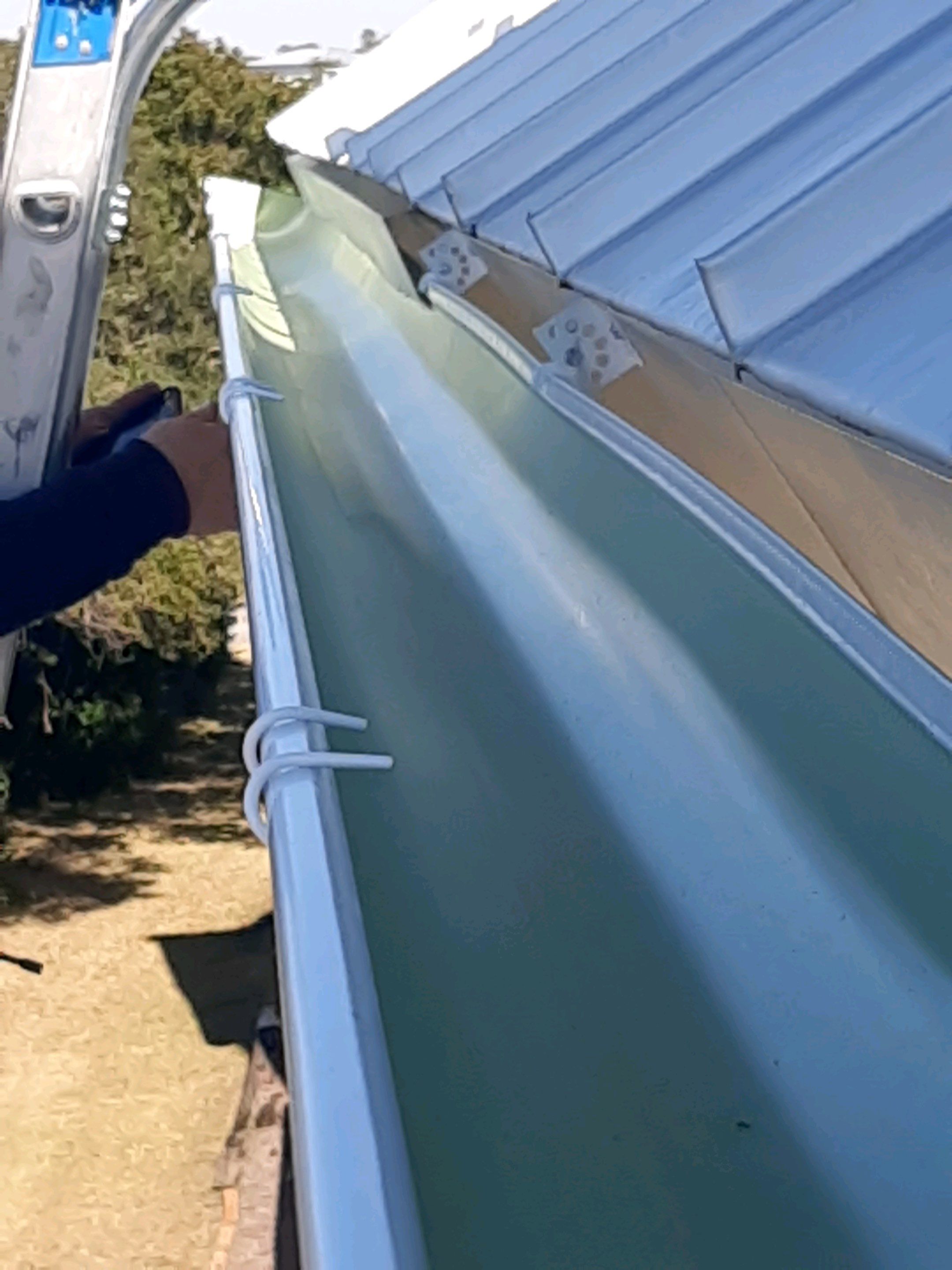 Gutter Installation Using 6 Inch Seamless Aluminum Gutters by Gutter Professors