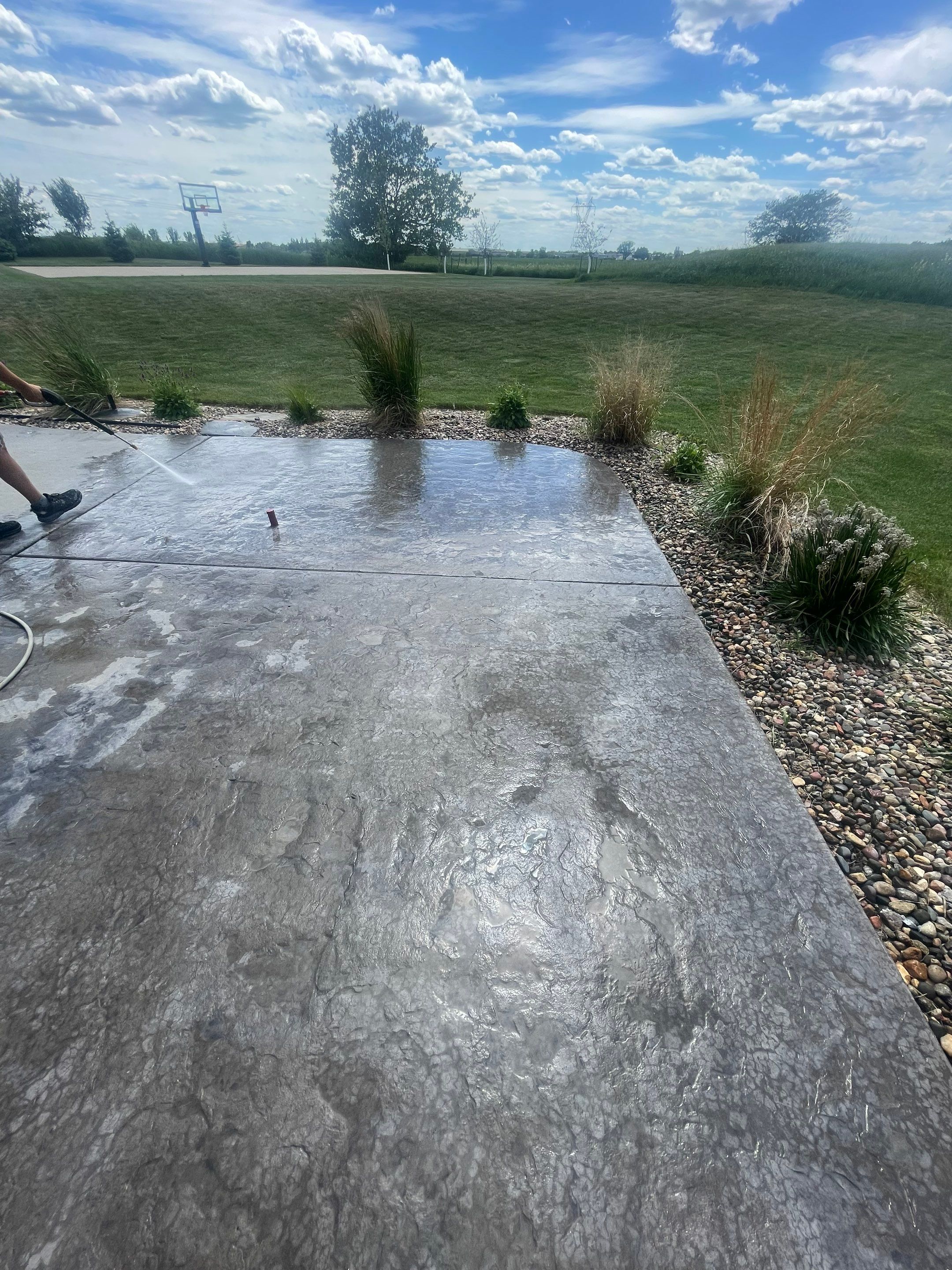 Concrete Patio Restoration and Installation in Sioux Falls by Select Painting, Coatings & Garage Cabinets