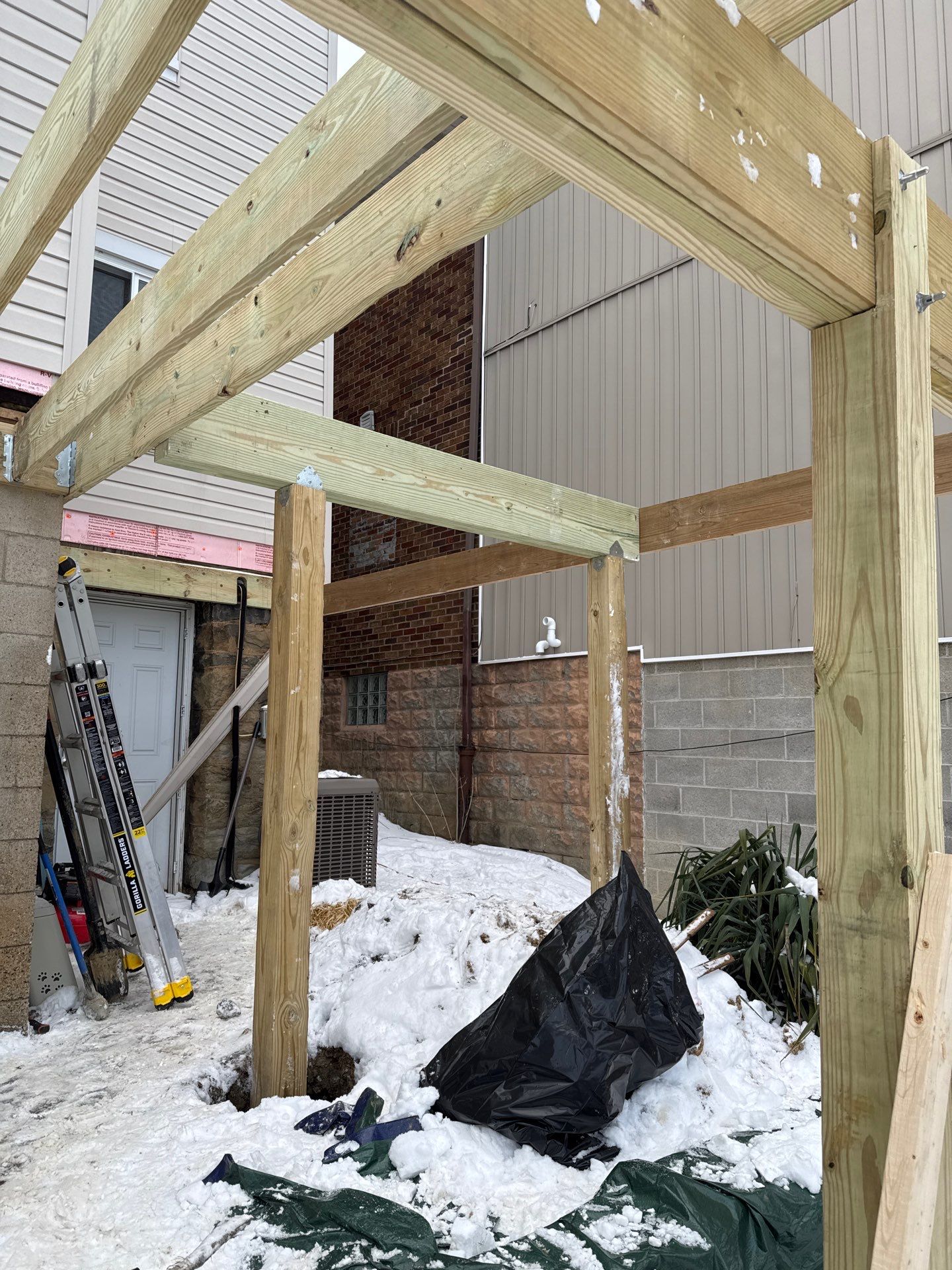 Deck and door by Cousins Roofing Siding & Decks