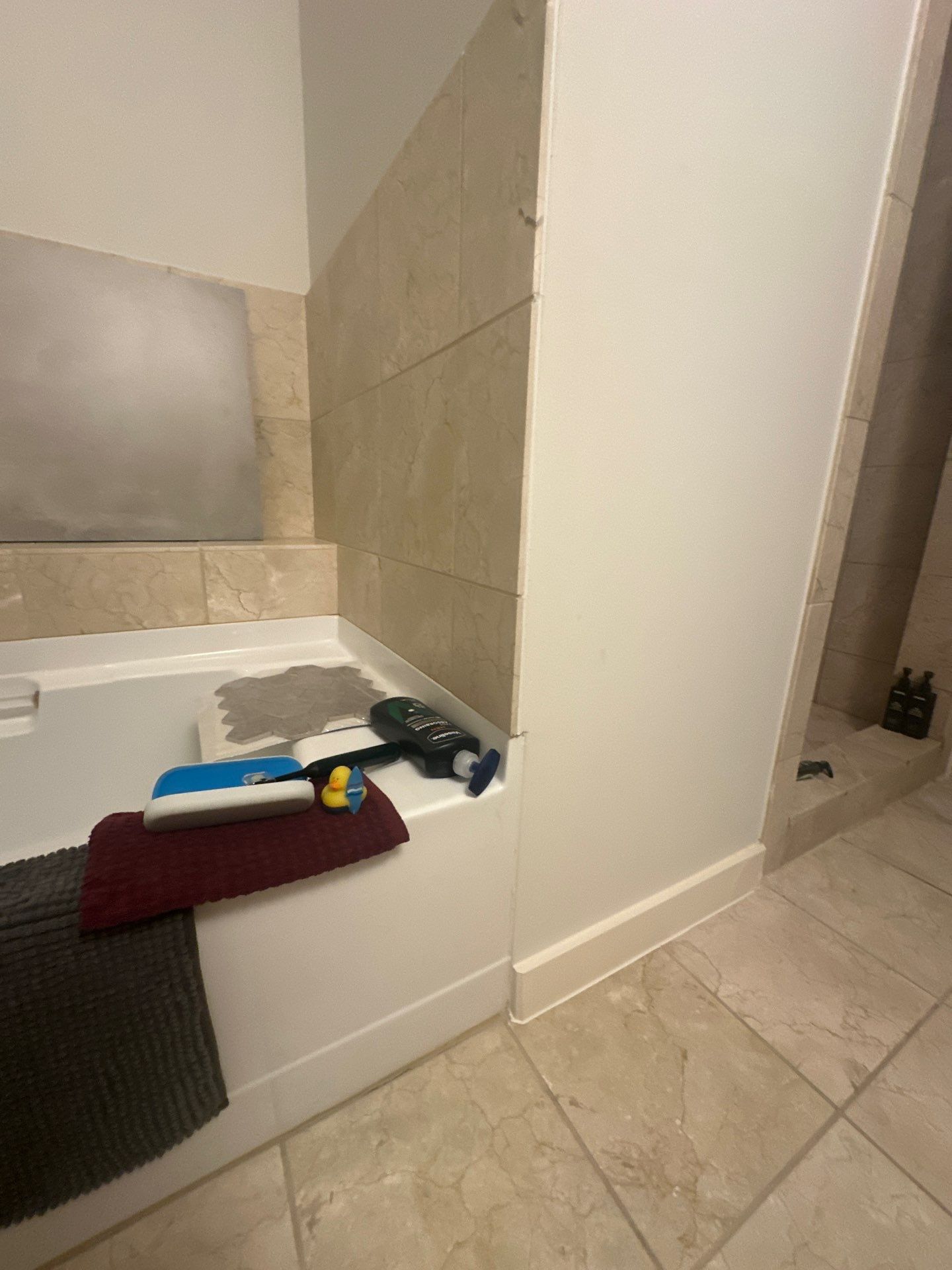 Modern Bathroom Transformation by Fine Line Flooring Inc.