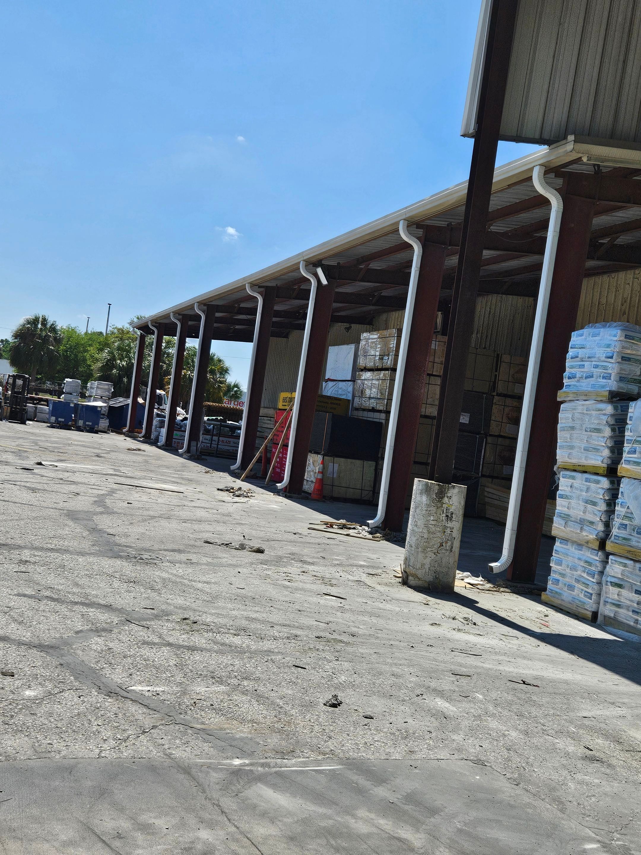 Commercial Box Gutters and White Downspouts Installation in Tampa FL by Gutter Professors