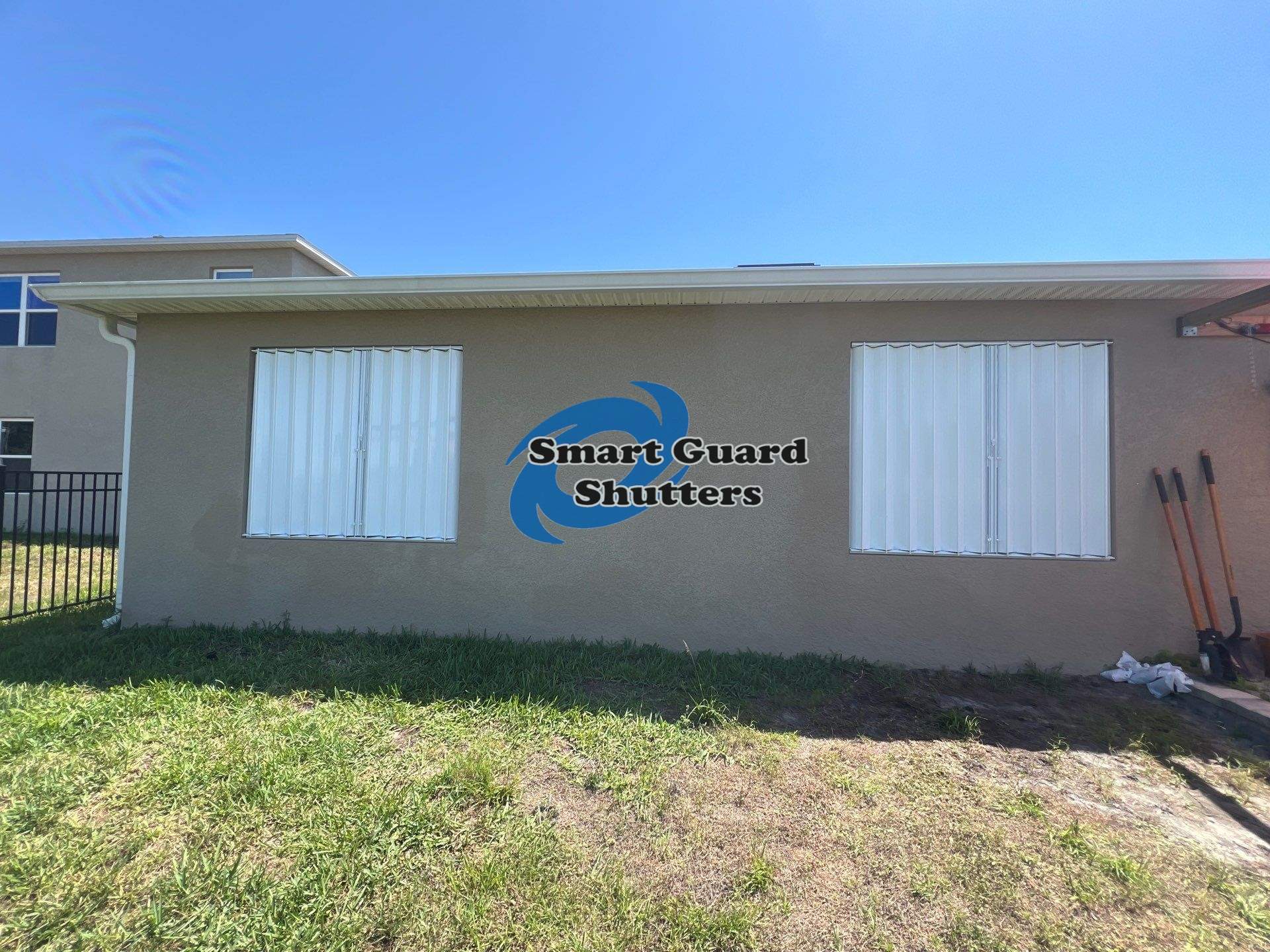 Hurricane protection in Beige/White by Smart Guard Shutters