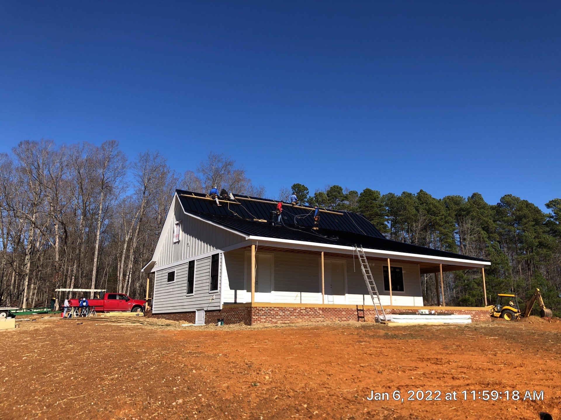 Custom Home Metal Roof Installation by Just In Time Roofing and Restoration