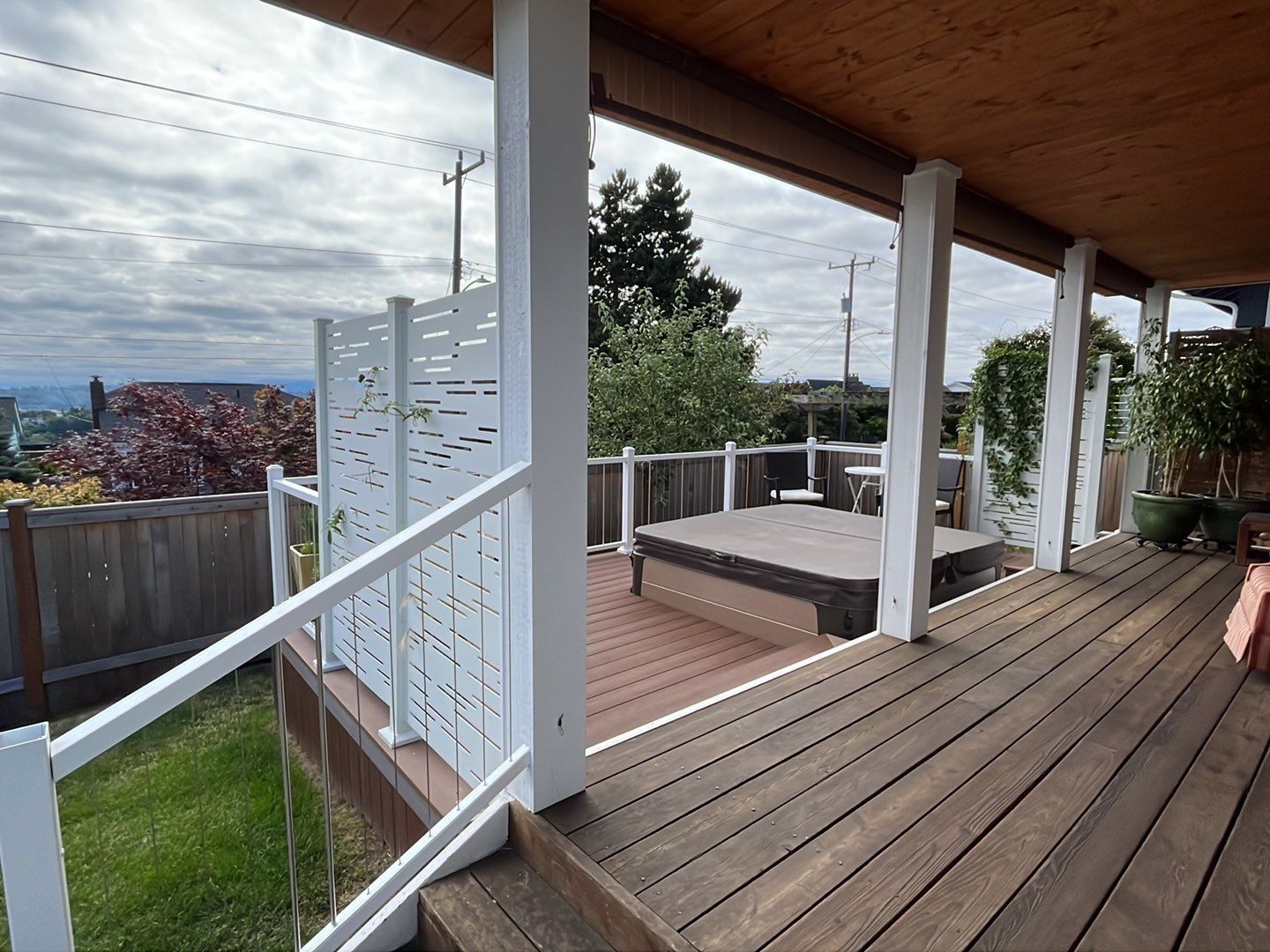 Deck Extension with Hideaway Screen by Alki deck builders 