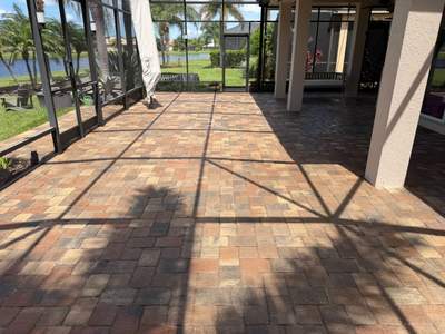Valencia Lakes Screened-In Lanai Paver Restoration and Sealing in Wimauma