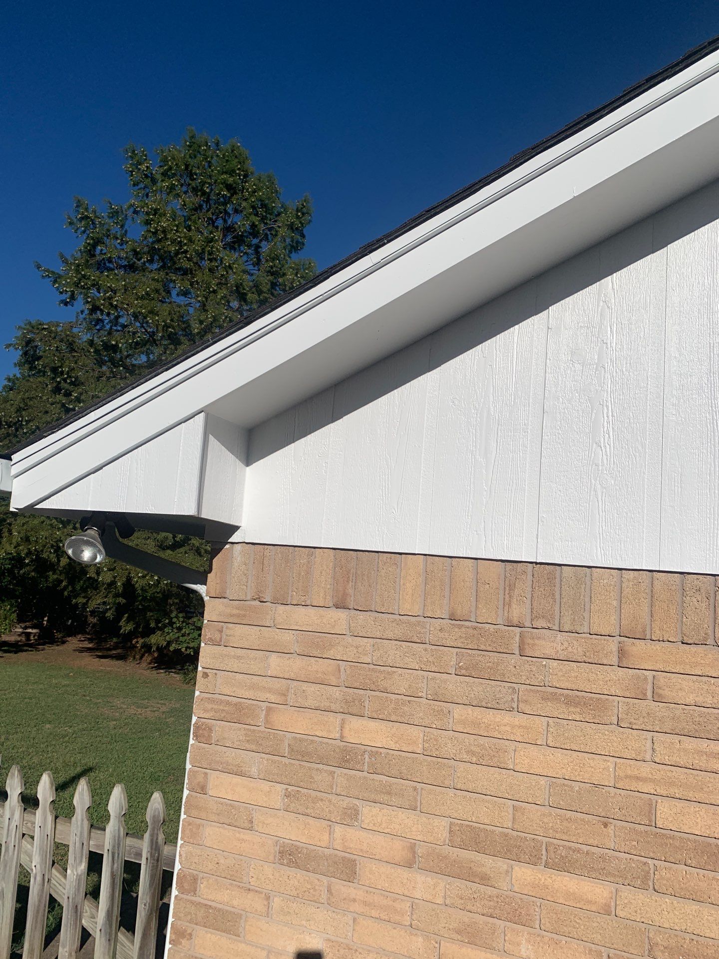 gutter install & soffit repair & exterior paiting in Oklahoma City by McCann's Roofing and Construction