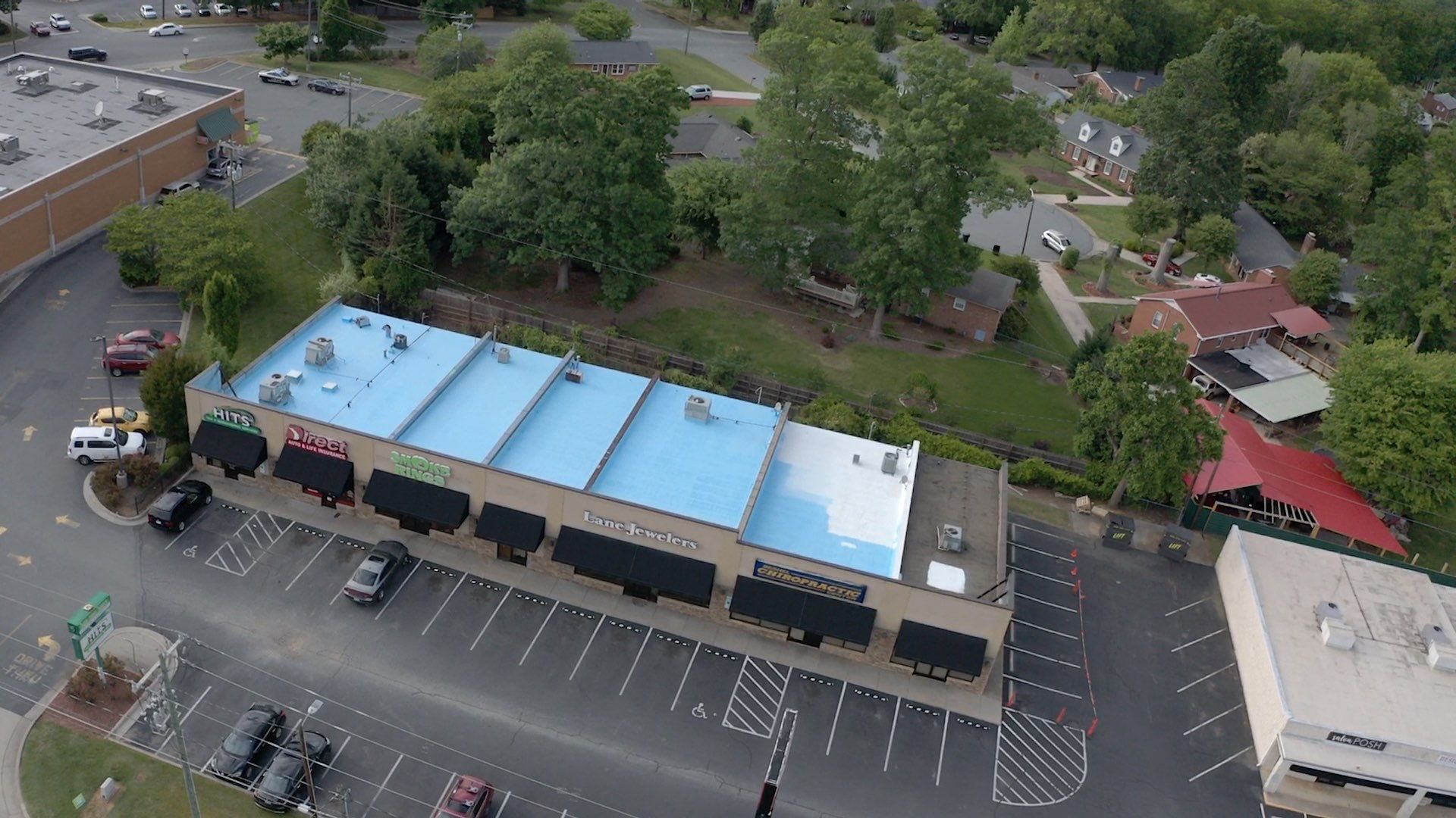 Commercial Roof Coating using Fiberseal basecoat and Silicon Topcoat by Just In Time Roofing and Restoration
