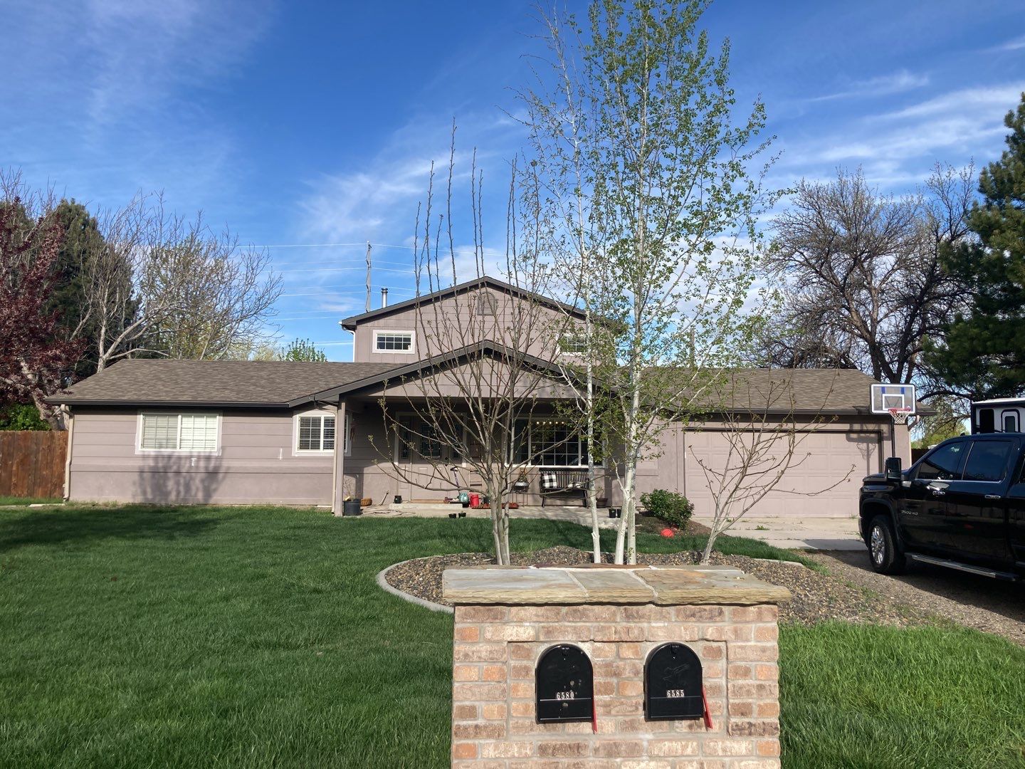 Breaking News!  Happy Homeowner gets a fantastic new roof by ID Roofing LLC