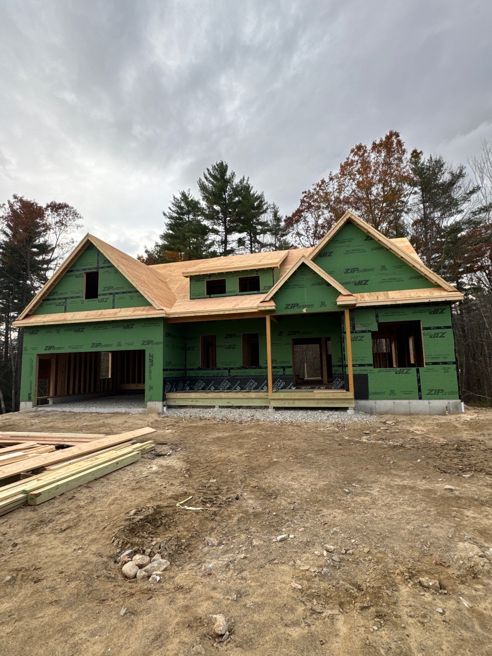 Auburn, NH New Construction Roof Installation With CertainTeed Asphalt & Standing Seam Metal Accents by Compass exteriors