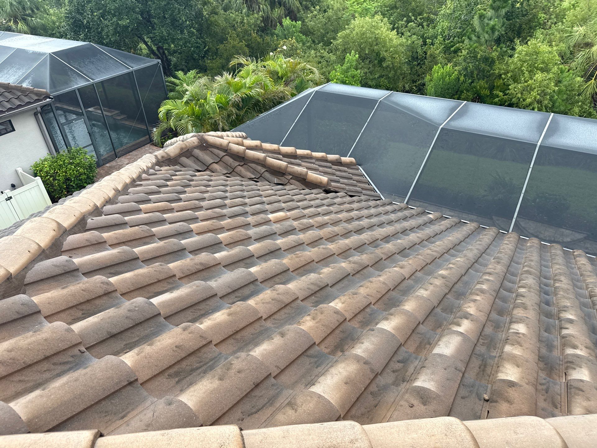 Concrete Tile Roof, Paver Driveway & Lanai Cleaning – Artisan Lakes Esplanade, Palmetto, FL by Sunshine AquaWash