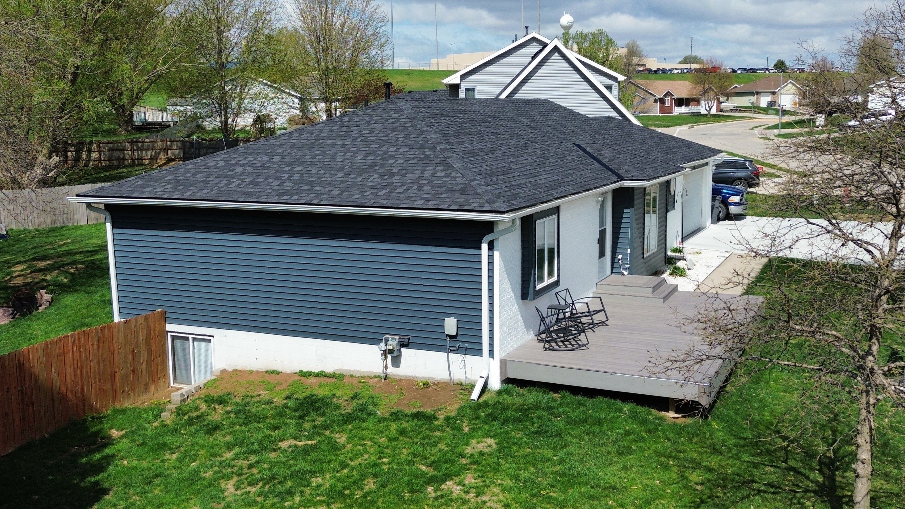 Roofing / Siding / Gutters using IKO Dynasty Granite Black / Norandex Siding by Lightning Exteriors