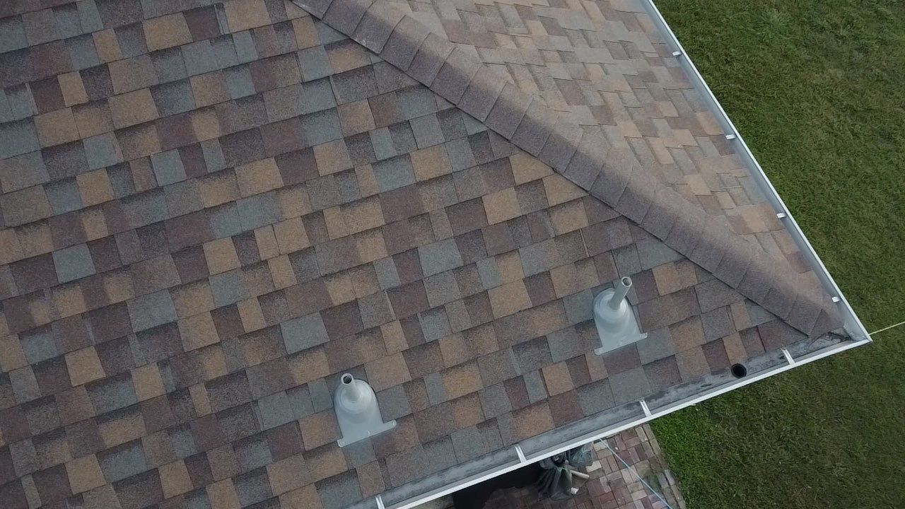 Owens Corning Shingle Roofing Replacement for Houston Two-Story Home by Houston Roofing & Construction